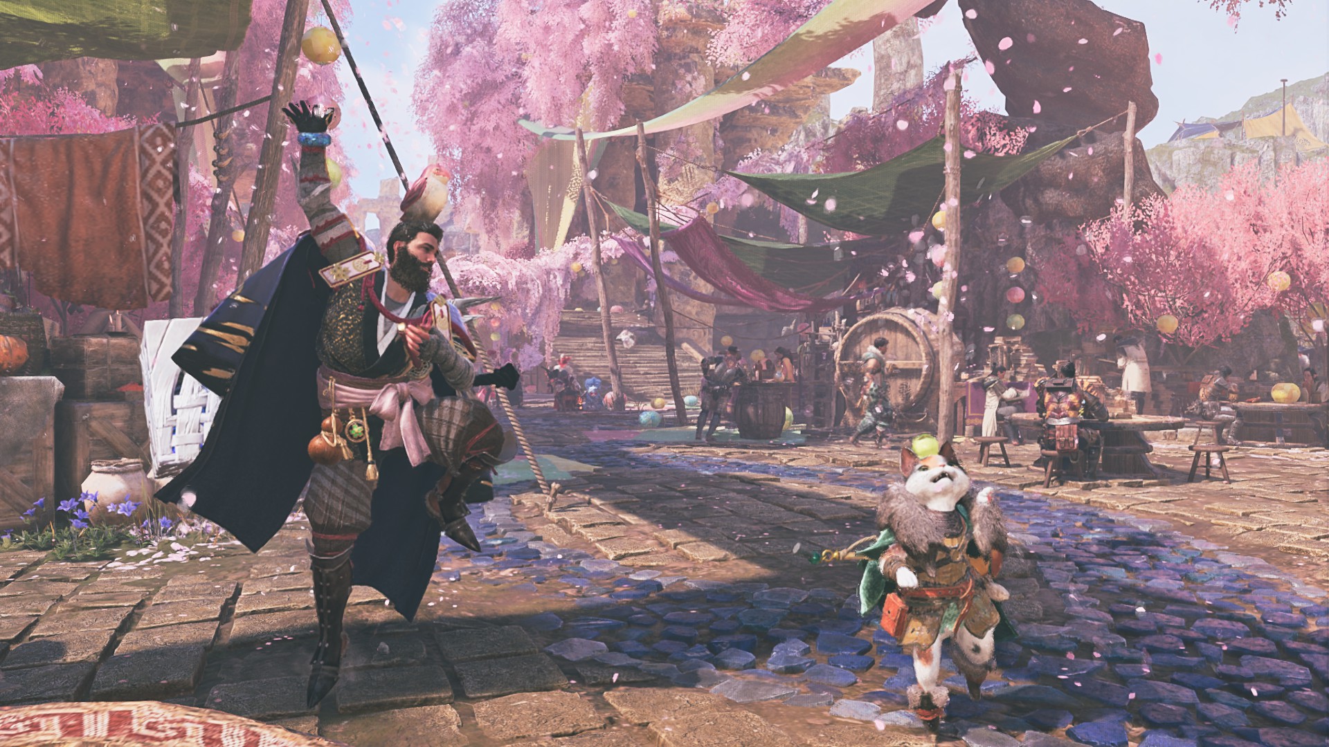 A hunter and palico toss cherry blossoms in the air in Monster Hunter Wilds.
