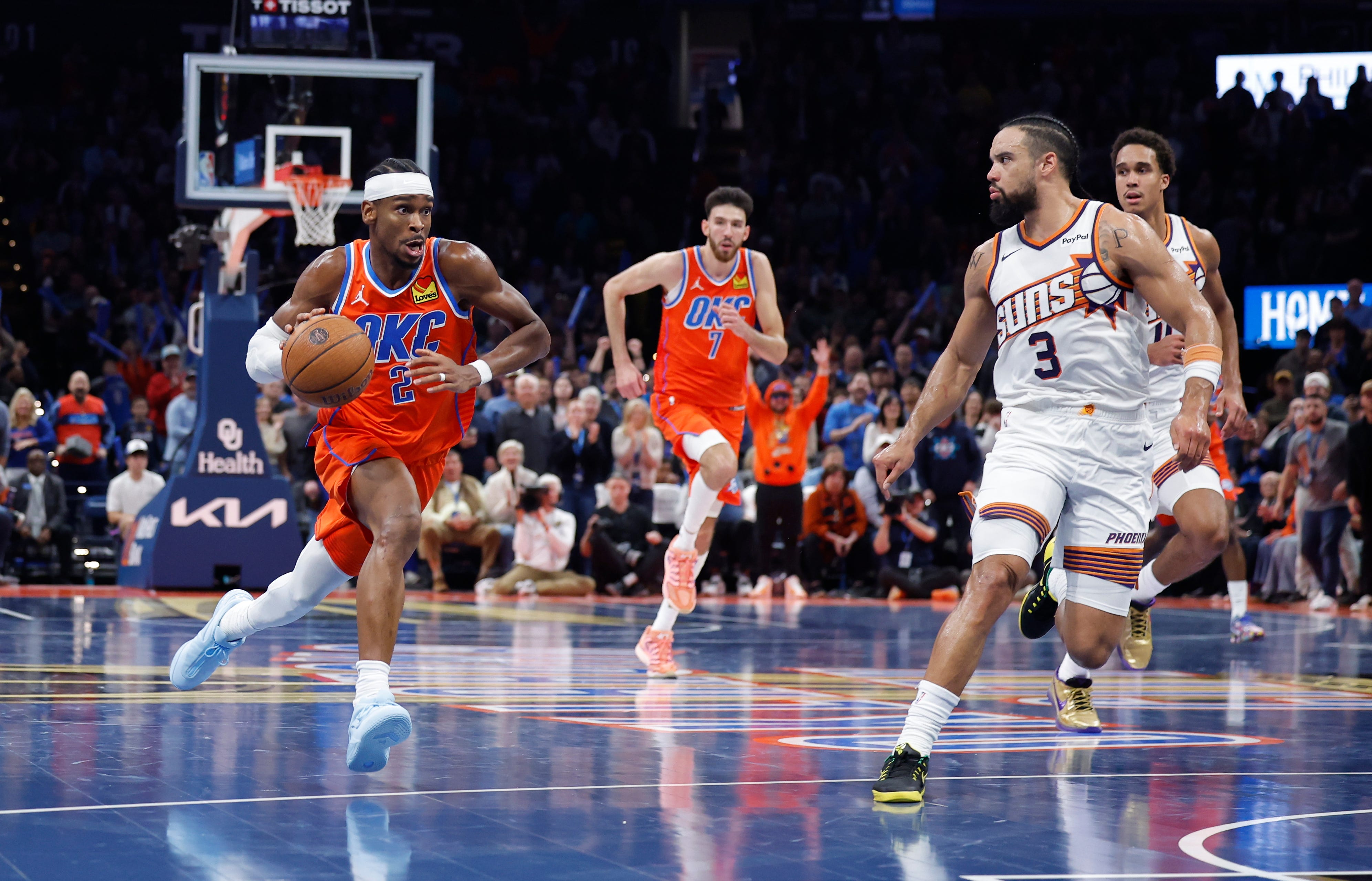 Nov 28, 2025; Oklahoma City, Oklahoma, USA; Oklahoma City Thunder guard Shai Gilgeous-Alexander (2) drives down the court beside Phoenix Suns forward Dillon Brooks (3) during the second half at Paycom Center. Mandatory Credit: Alonzo Adams-Imagn Images