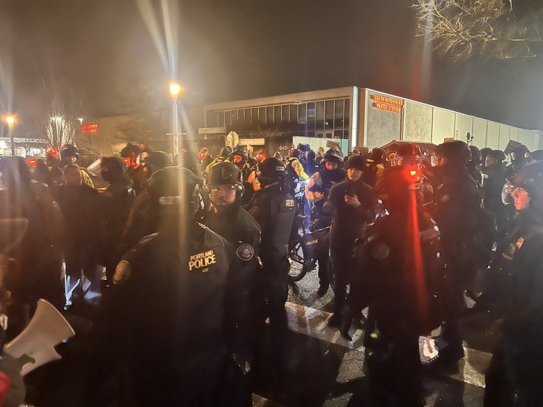 Local Portland police cleared protesters from the road in front of the South Waterfront ICE facility in Portland, Oregon. Photo by Shane Burley.