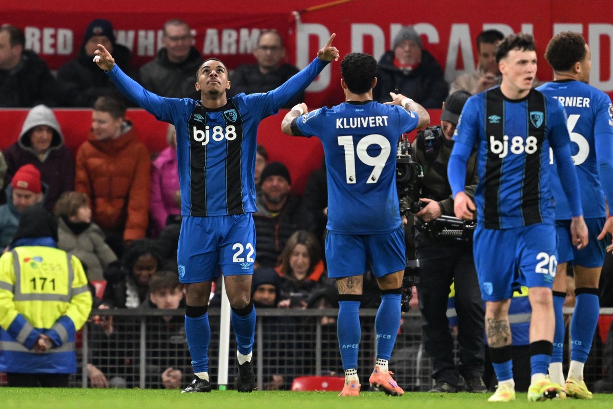 Eli Junior Kroupi celebrates Bournemouth's equaliser on a frenzied night at Old Trafford (AFP via Getty Images)