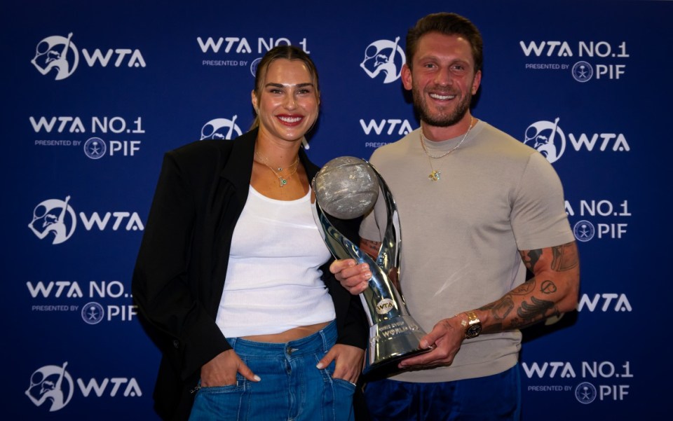 RIYADH, SAUDI ARABIA - NOVEMBER 09: Aryna Sabalenka and boyfriend Georgios Frangulis pose with the Chris Evert World No.1 trophy to commemorate finishing the season on top of the PIF WTA Singles Ranking on Finals Day of WTA Finals Riyadh as part of the Hologic WTA Tour 2024 at King Saud University Indoor Arena on November 09, 2024 in Riyadh, Saudi Arabia (Photo by Robert Prange/Getty Images)