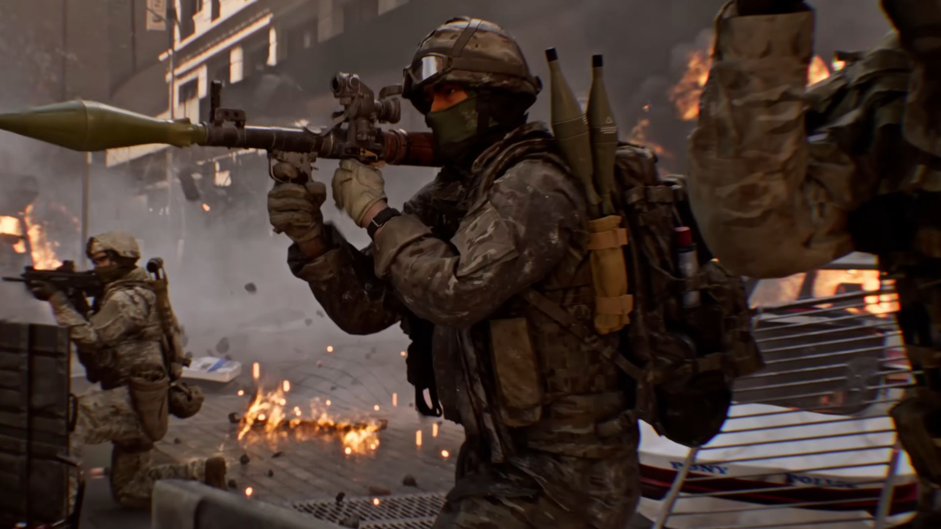 Soldier from the Battlefield 6 trailer, clad in green camo and mostly all covered except for their eyes. They're holding an RPG and pointing it off screen.