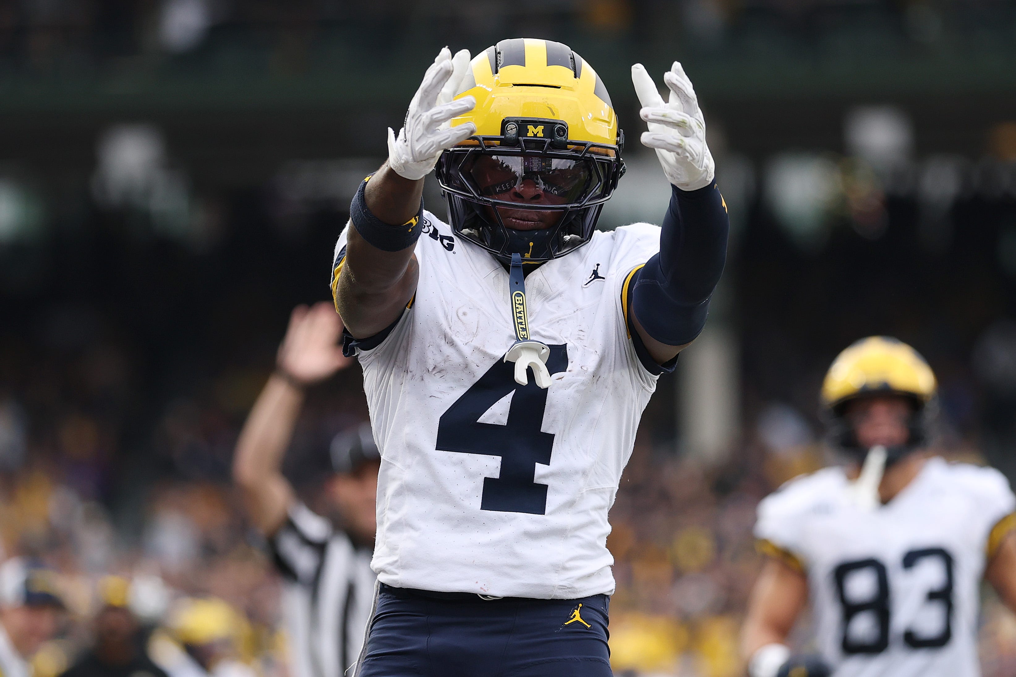 Michigan's Andrew Marsh celebrates a catch against Northwestern during the first half at Wrigley Field on November 15, 2025 in Chicago.
