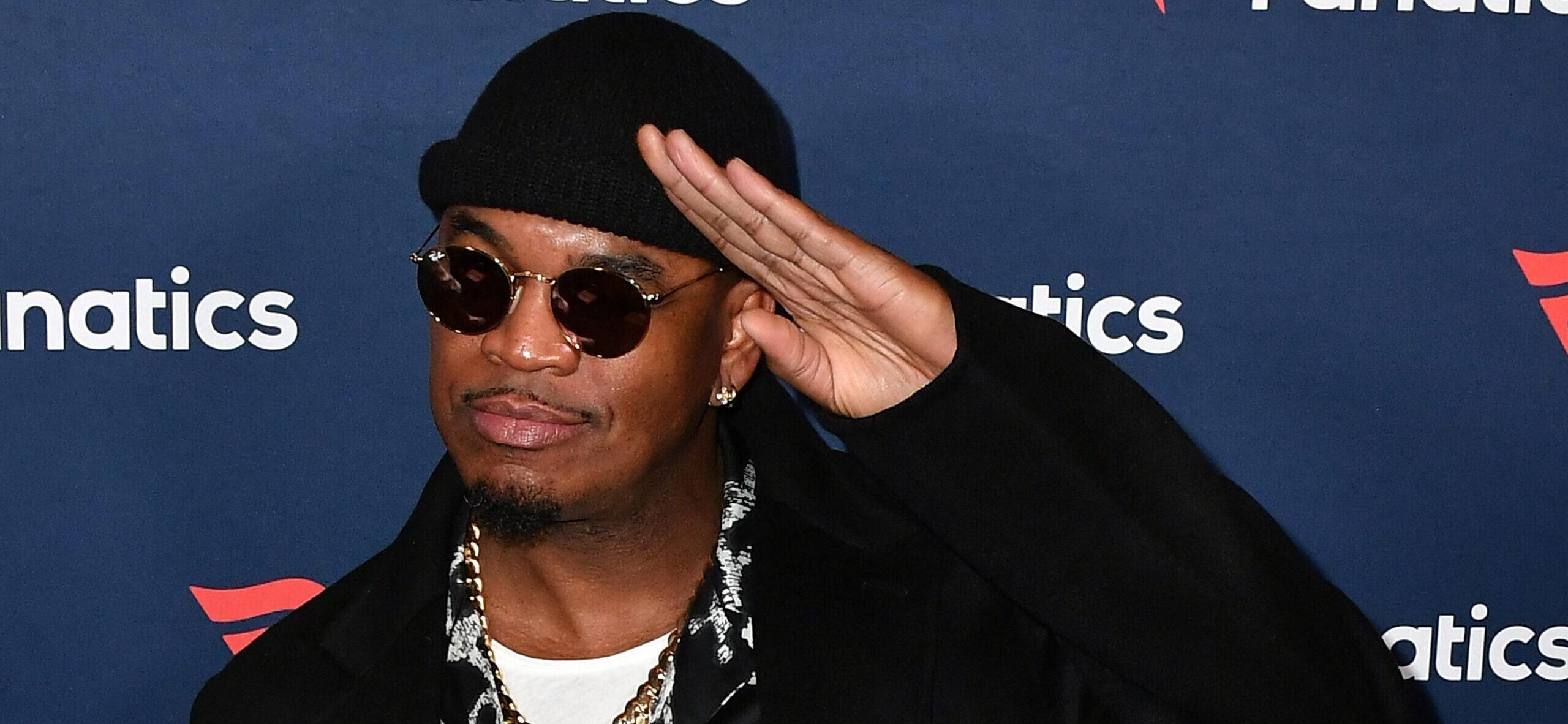 Ne-Yo posing in black on the red carpet.