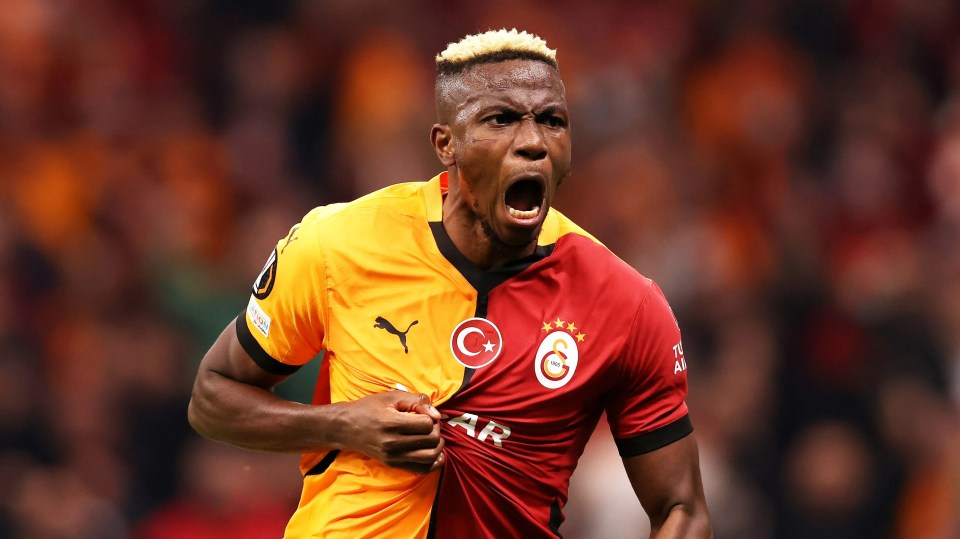 Galatasaray player celebrating a goal.