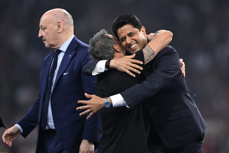 MUNICH, GERMANY - MAY 31: Luis Enrique, Head Coach of Paris Saint-Germain, celebrates with Nasser Al-Khelaifi, President of Paris Saint-Germain after winning the UEFA Champions League Final 2025 between Paris Saint-Germain and FC Internazionale Milano at the Munich Arena on May 31, 2025 in Munich, Germany. (Photo by Justin Setterfield/Getty Images)