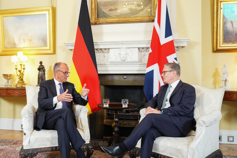 LONDON, UNITED KINGDOM - JULY 17: (EDITOR&rsquo;S NOTE: This Handout image was provided by a third-party organization and may not adhere to Getty Images&rsquo; editorial policy.) In this handout image provided by the German Government Press Office (BPA), German Chancellor Friedrich Merz speaks with British Prime Minister Keir Starmer at 10 Downing Street on July 17, 2025 in London, England. (Photo by Steffen Kugler/Bundesregierung via Getty Images)