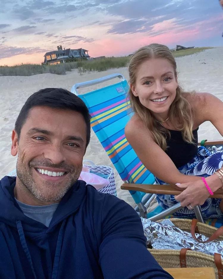 Kelly Ripa and Mark Consuelos at beach