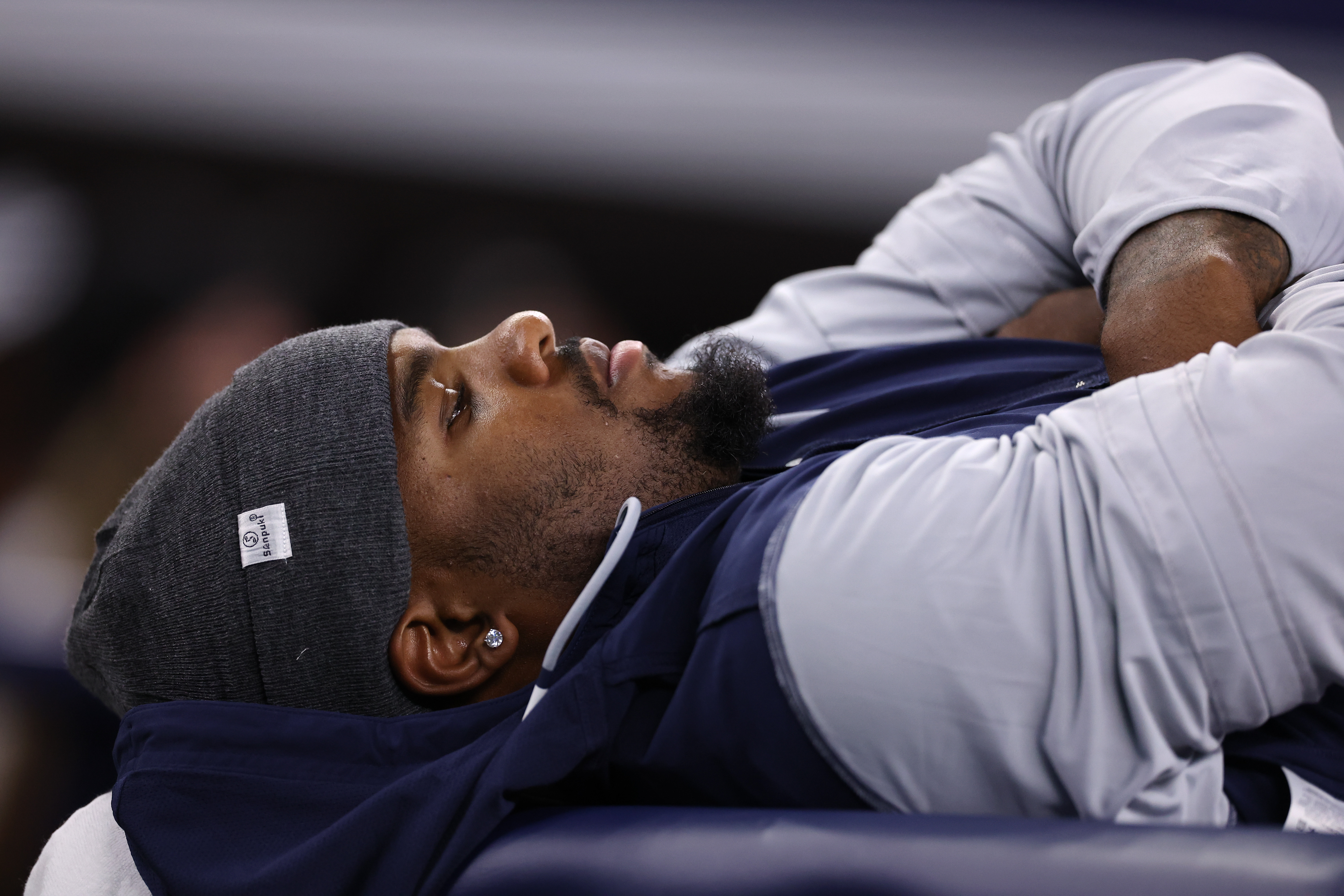 ARLINGTON, TEXAS - AUGUST 22: Micah Parsons #11 of the Dallas Cowboys lays on a training table during the second half of the NFL Preseason 2025 game against the Atlanta Falcons at AT&T Stadium on August 22, 2025 in Arlington, Texas. (Photo by Sam Hodde/Getty Images)
