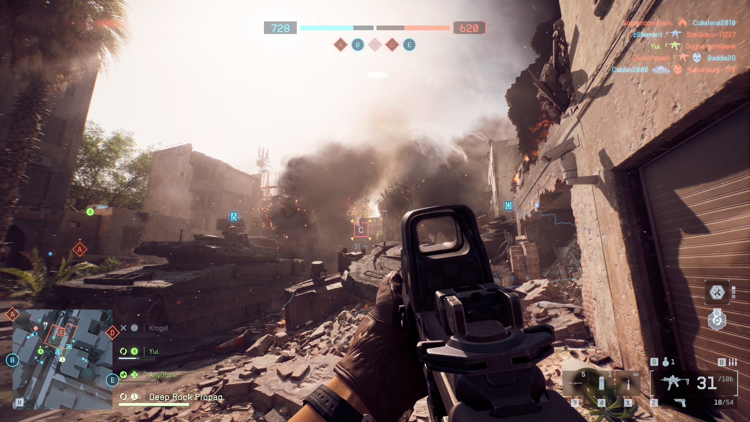 Battlefield 6 War Tapes VAL: A gameplay screenshot of a player looking at smoke clouds in the distance while a tank drives over rubble in the Siege of Cairo map.