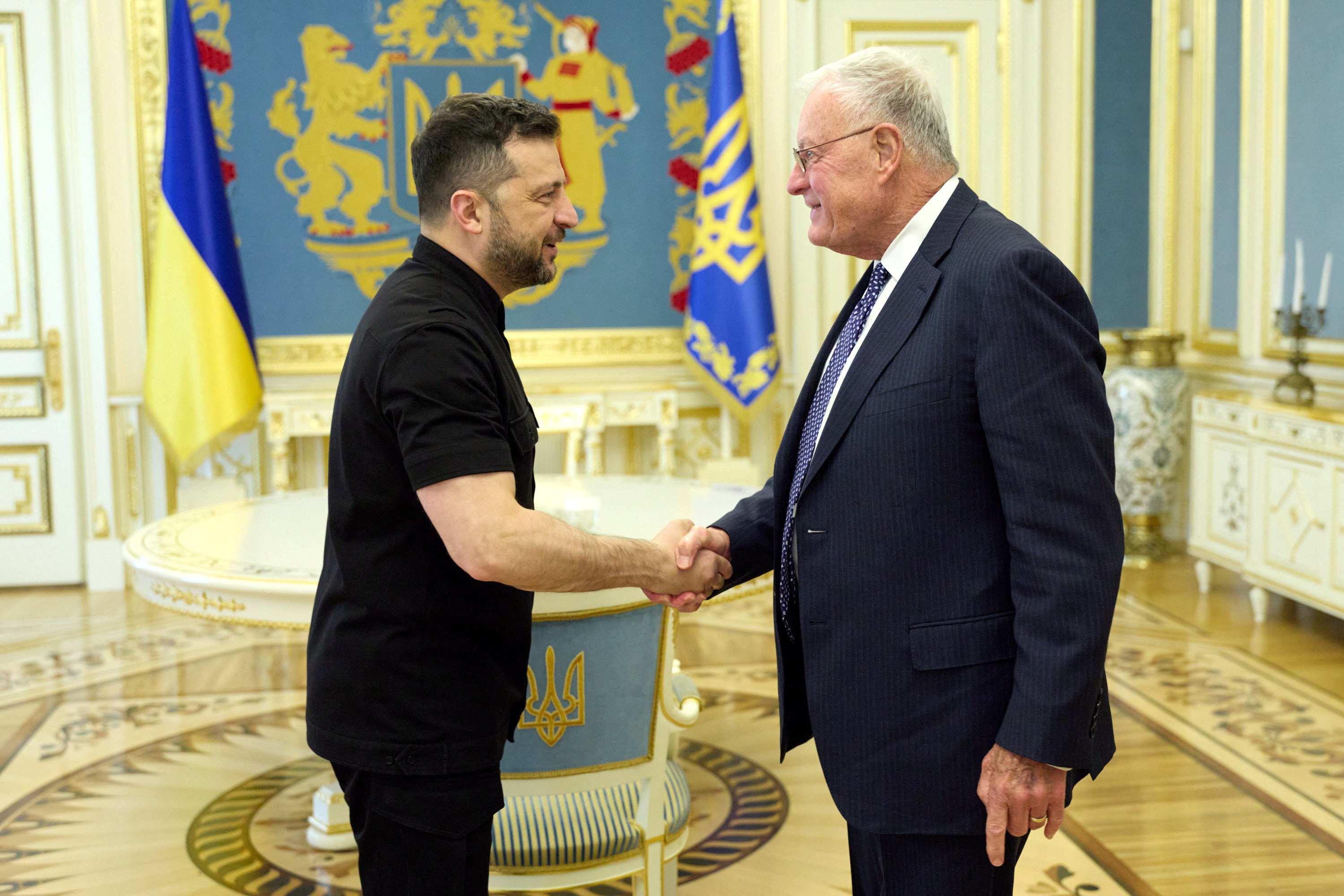 Ukraine's President Volodymyr Zelenskiy shakes hands with U.S. Special Envoy for Ukraine Keith Kellogg, amid Russia's attack on Ukraine, in Kyiv, Ukraine August 25, 2025. Ukrainian Presidential Press Service/Handout via REUTERS ATTENTION EDITORS - THIS IMAGE HAS BEEN SUPPLIED BY A THIRD PARTY.