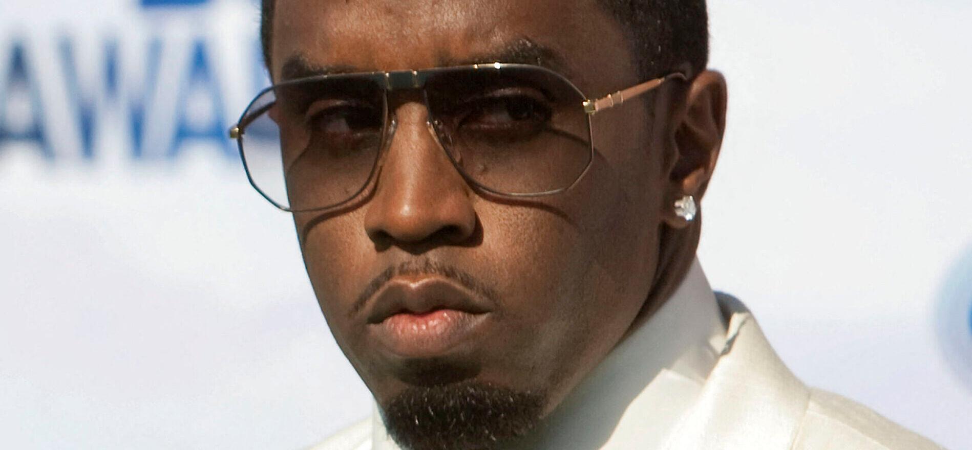 Diddy in white suit
