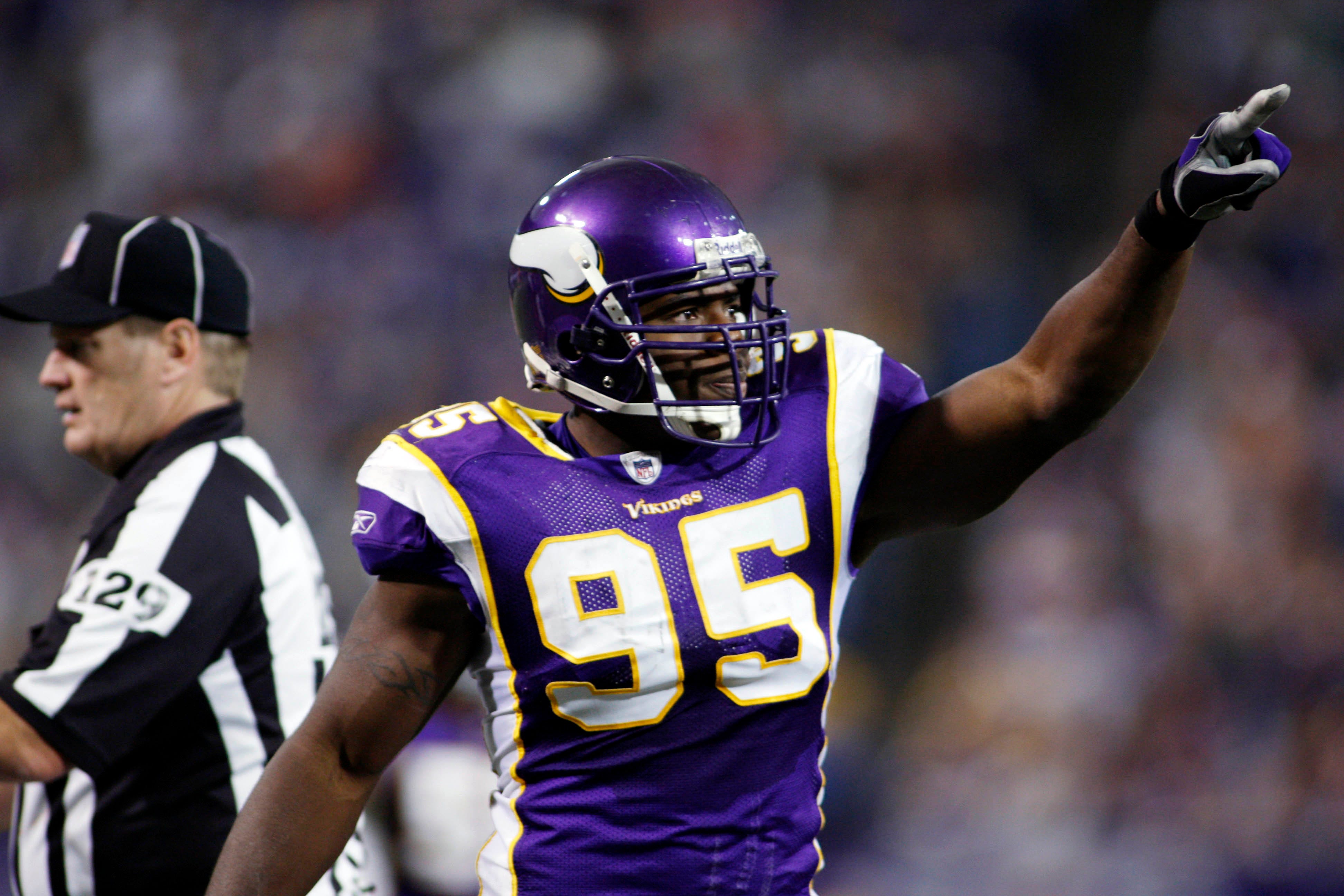 Minnesota Vikings defensive end Kenechi Udeze celebrates his sack in the third quarter against the Philadelphia Eagles at the Metrodome.