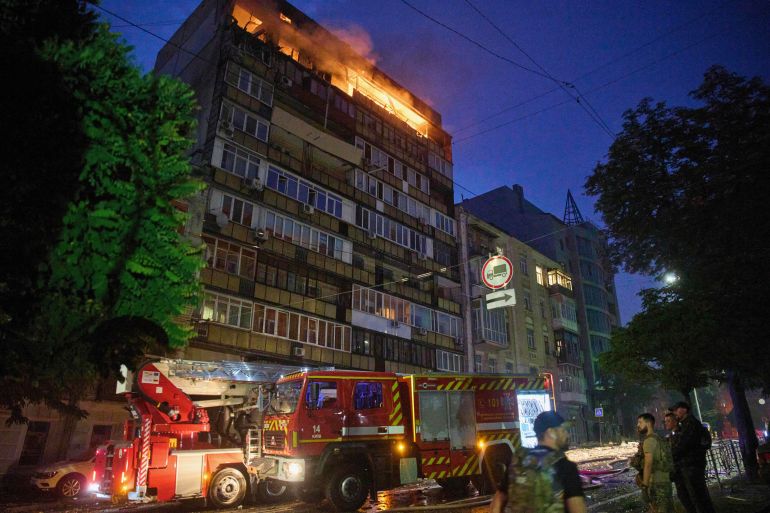 A fire burns at a residential building after a Russian attack in Kyiv, Ukraine, early Thursday, July 10, 2025. (AP Photo/Efrem Lukatsky)