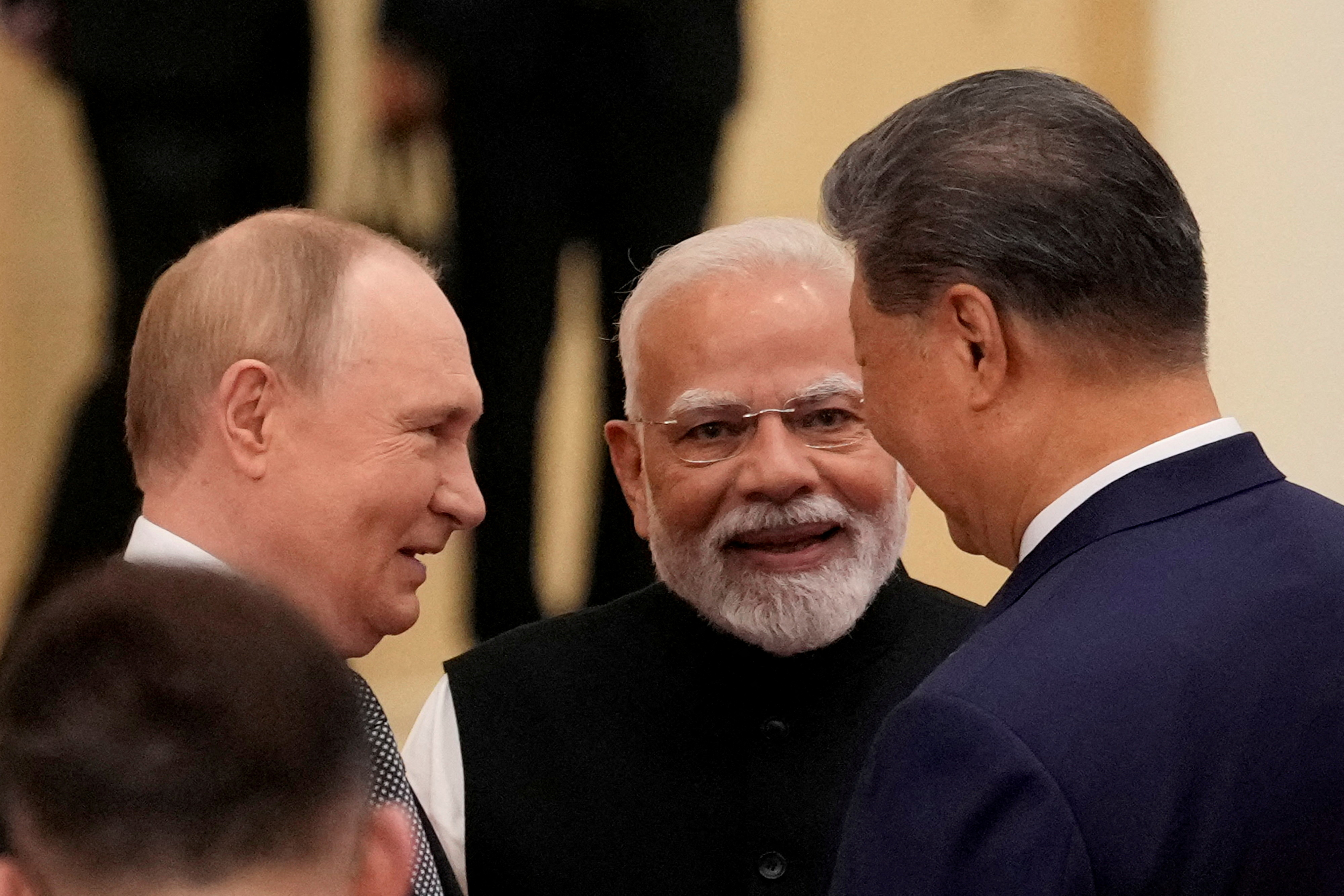 FILE PHOTO: Indian Prime Minister Narendra Modi talks with Russian President Vladimir Putin and Chinese President Xi Jinping ahead of the Shanghai Cooperation Organization (SCO) Summit 2025 at the Meijiang Convention and Exhibition Centre in Tianjin, China, September 1, 2025. SUO TAKEKUMA/Pool via REUTERS/File Photo