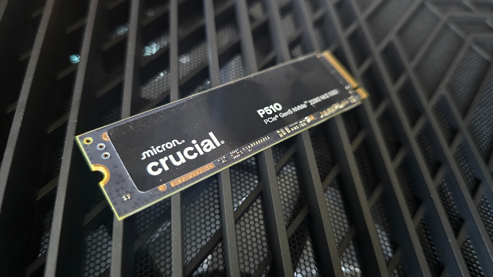 A Crucial P510 SSD installed in a gaming PC.