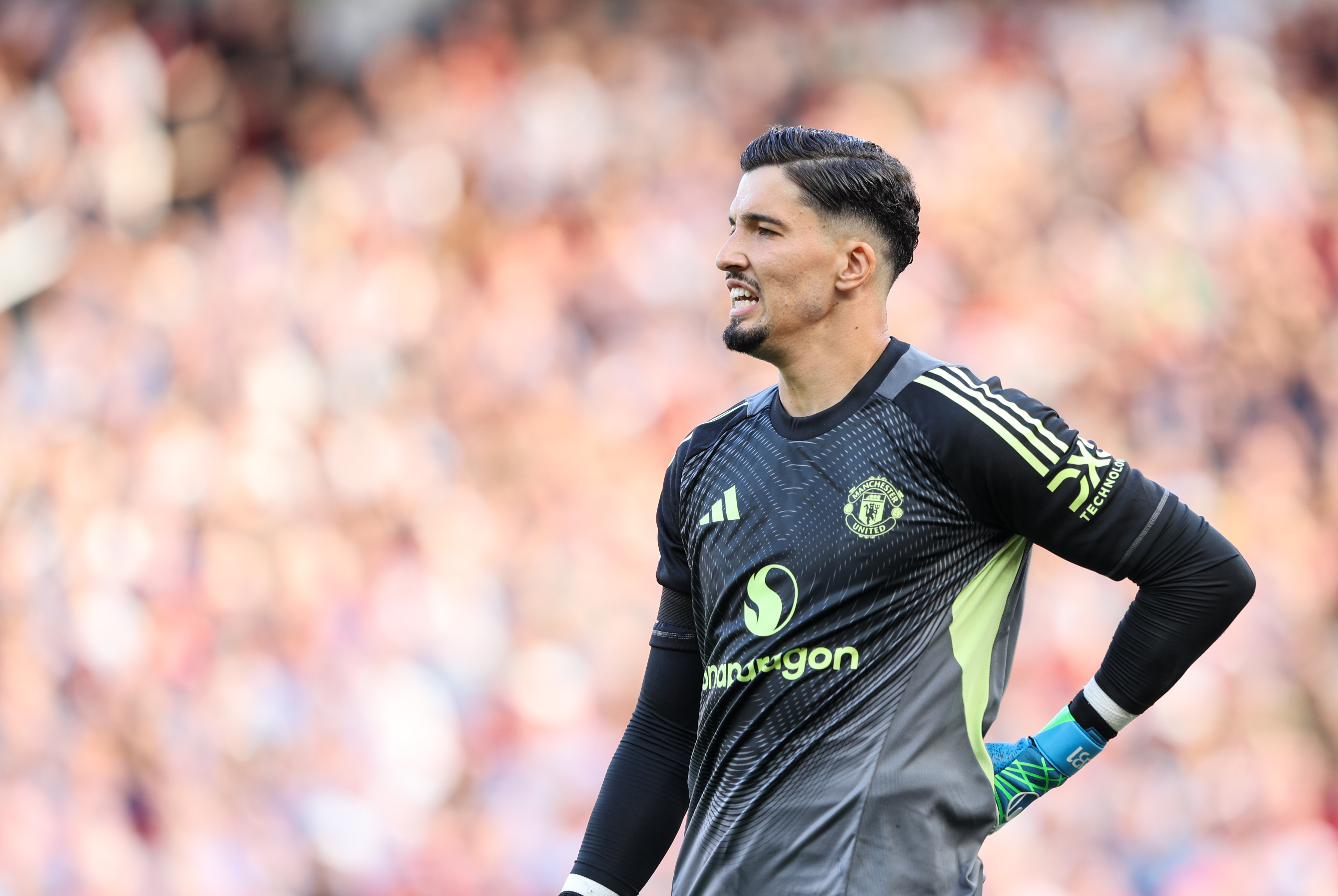 MANCHESTER, ENGLAND - AUGUST 17: Manchester United's Altay Bayindir in action during the Premier League match between Manchester United and Arsenal at Old Trafford on August 17, 2025 in Manchester, England. (Photo by Alex Dodd - CameraSport via Getty Images)