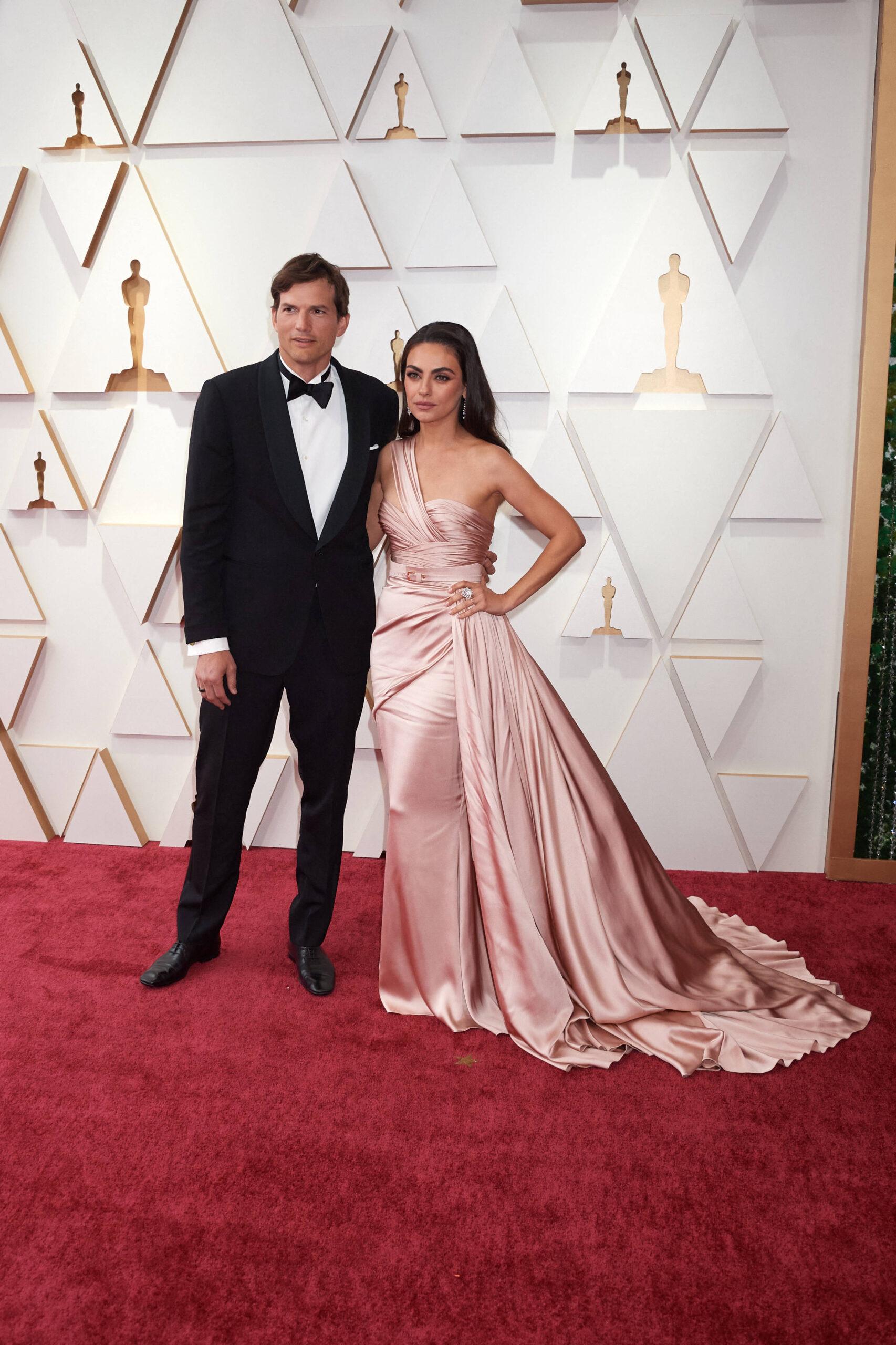 Ashton Kutcher and Mila Kunis arrive on the red carpet at the 94th Oscars at Dolby Theatre