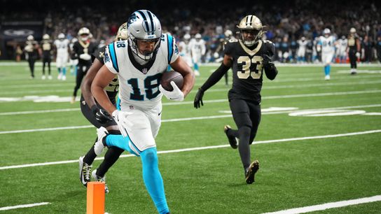 Dec 14, 2025; New Orleans, Louisiana, USA; Carolina Panthers wide receiver Jalen Coker (18) scores a touchdown in the third quarter against the New Orleans Saints at Caesars Superdome. 