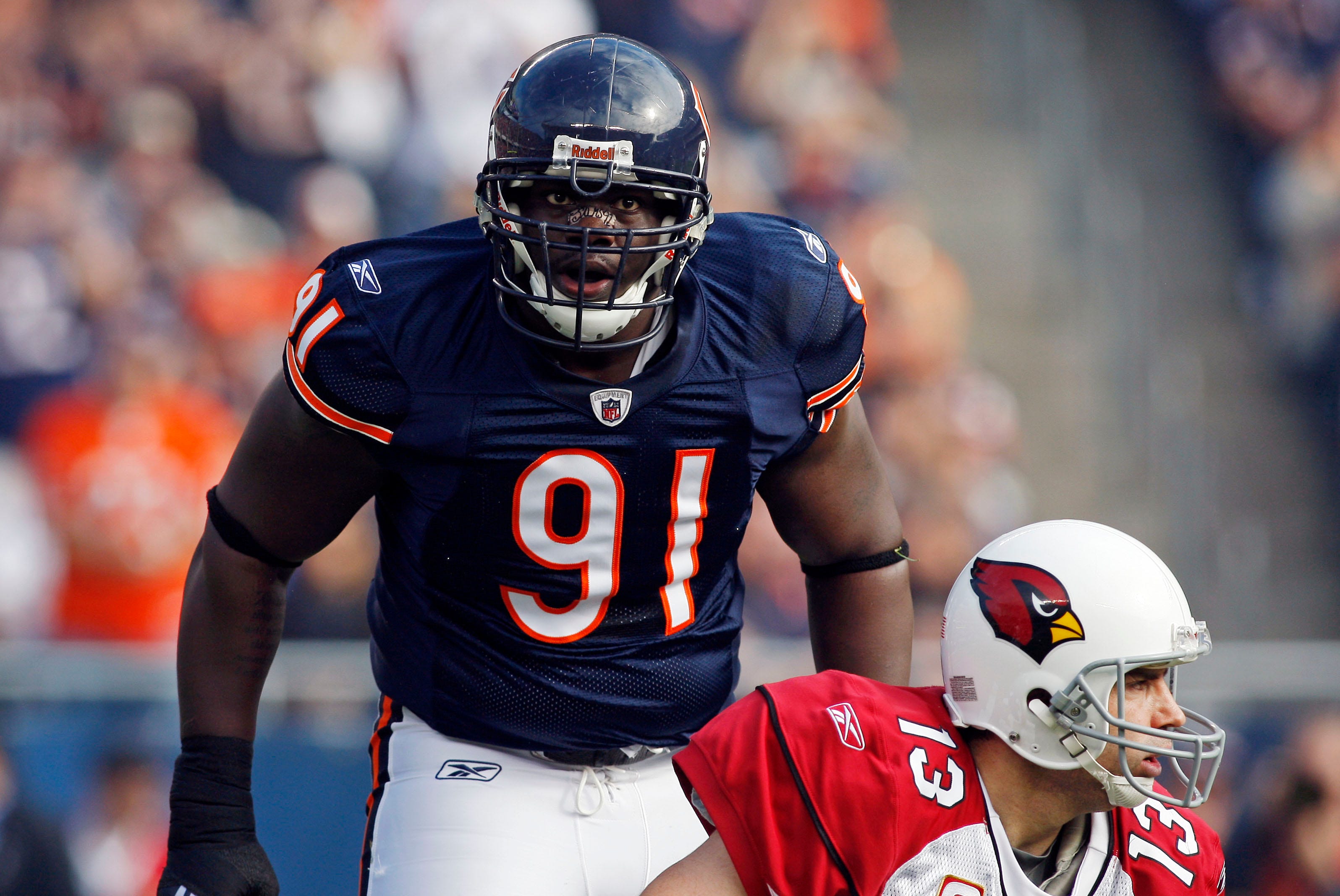 Chicago Bears defensive tackle Tommie Harris reacts after pressuring Arizona Cardinals quarterback Kurt Warner.