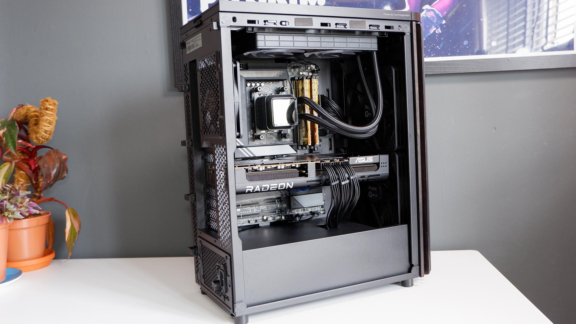 A gaming PC in the process of being built, using Radeon and Ryzen components and an Asus Pro Art PA401 PC case.