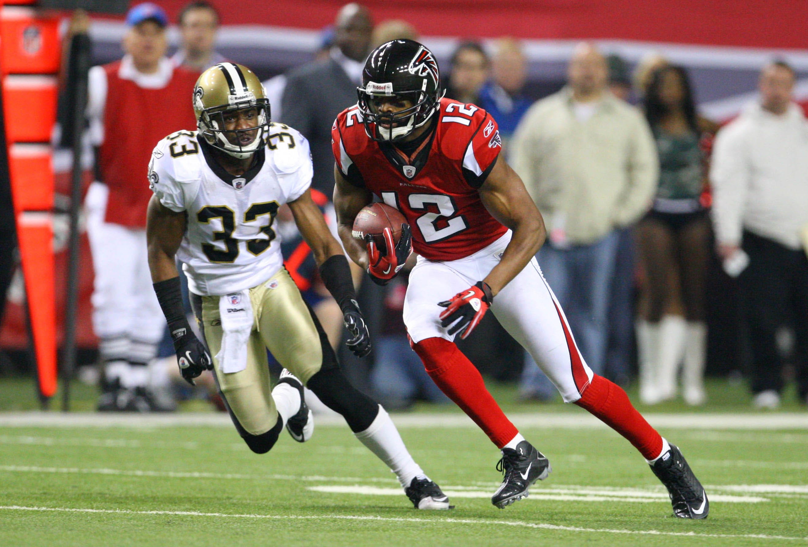 Atlanta Falcons wide receiver Michael Jenkins runs after a catch against the New Orleans Saints.