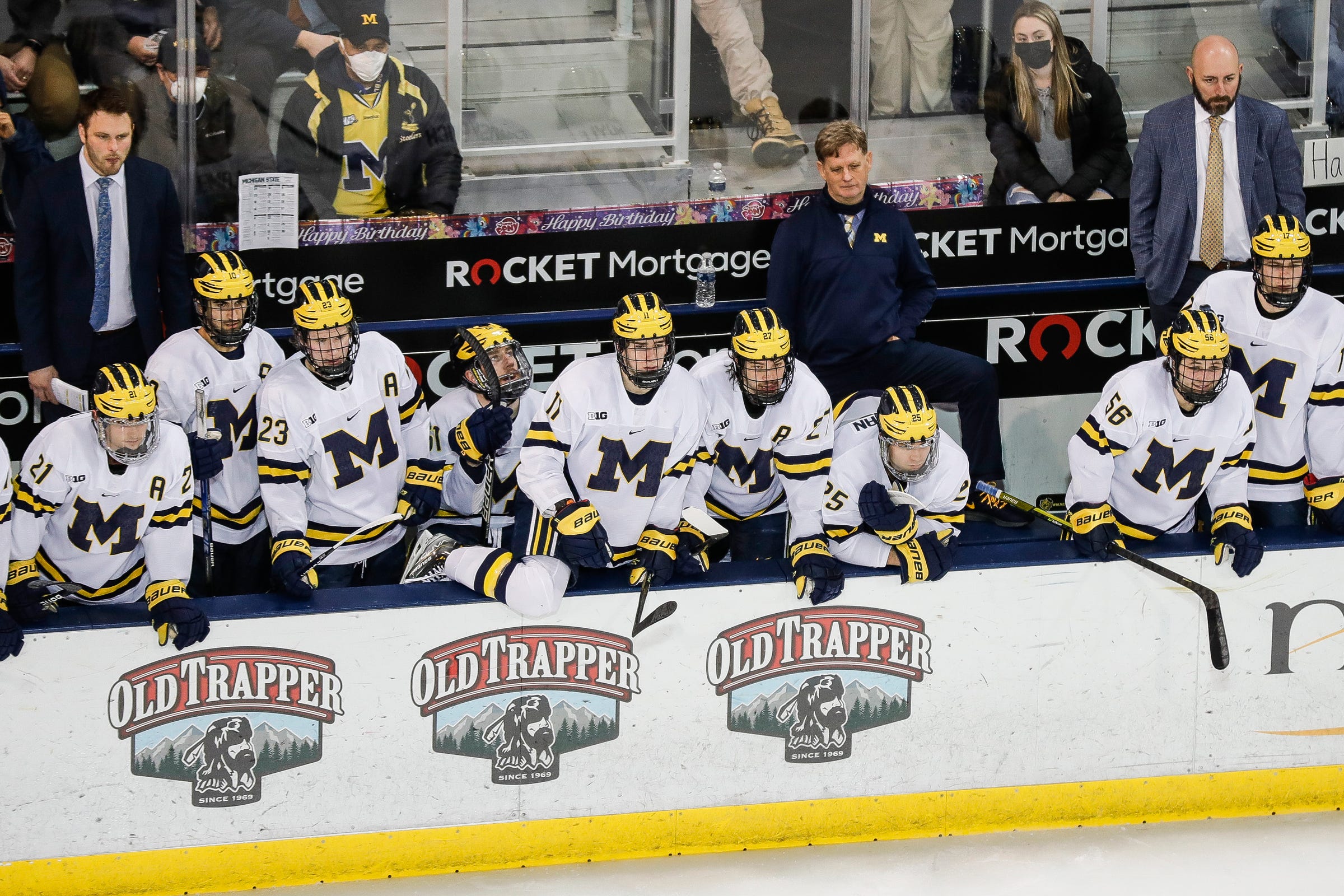 Michigan head coach Mel Pearson watches a play against Michigan State during the second period in the first game of a Big Ten quarterfinal at Yost Ice Arena in Ann Arbor on Friday, March 4, 2022.