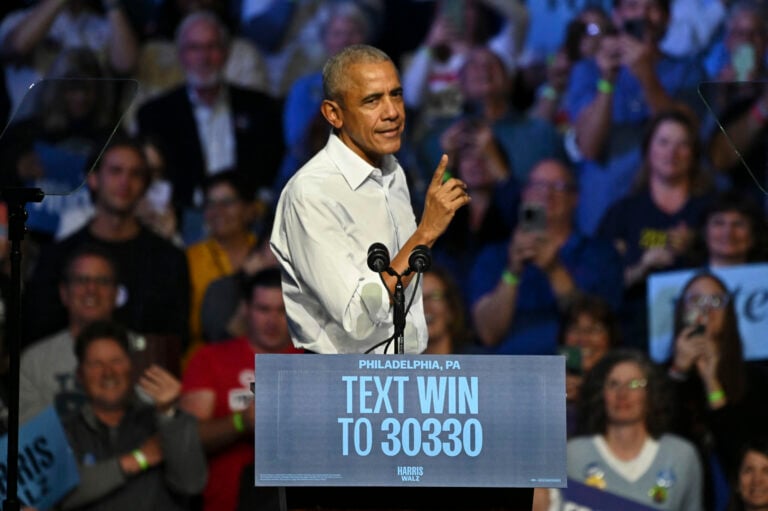Barack Obama speaks on stage
