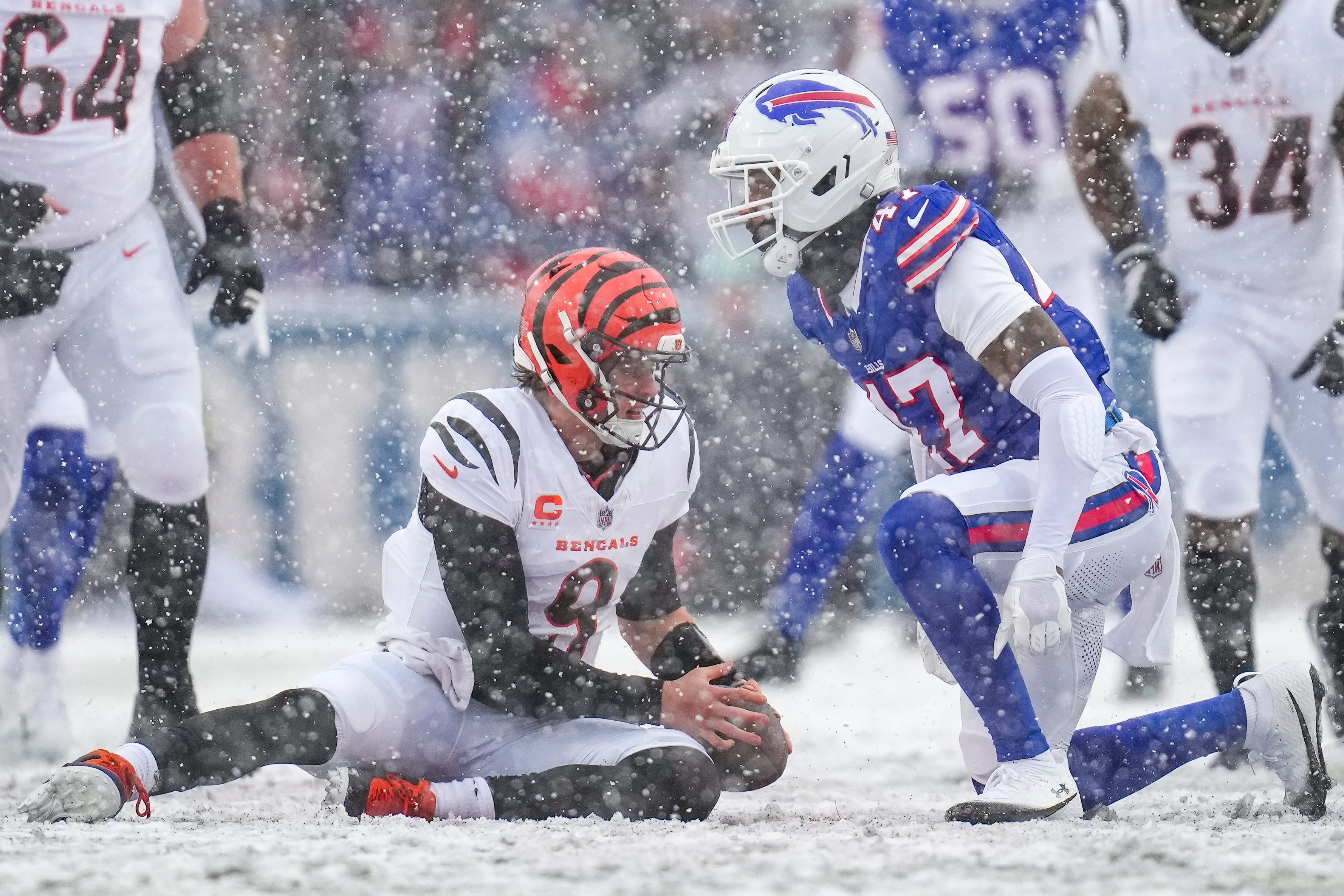 Cincinnati Bengals quarterback Joe Burrow (9) is sacked by Buffalo Bills cornerback Christian Benford (47) in the second quarter of the NFL Week 14 game between the Buffalo Bills and the Cincinnati Bengals at Highmark Stadium in Orchard Park, N.Y., on Sunday, Dec. 7, 2025.