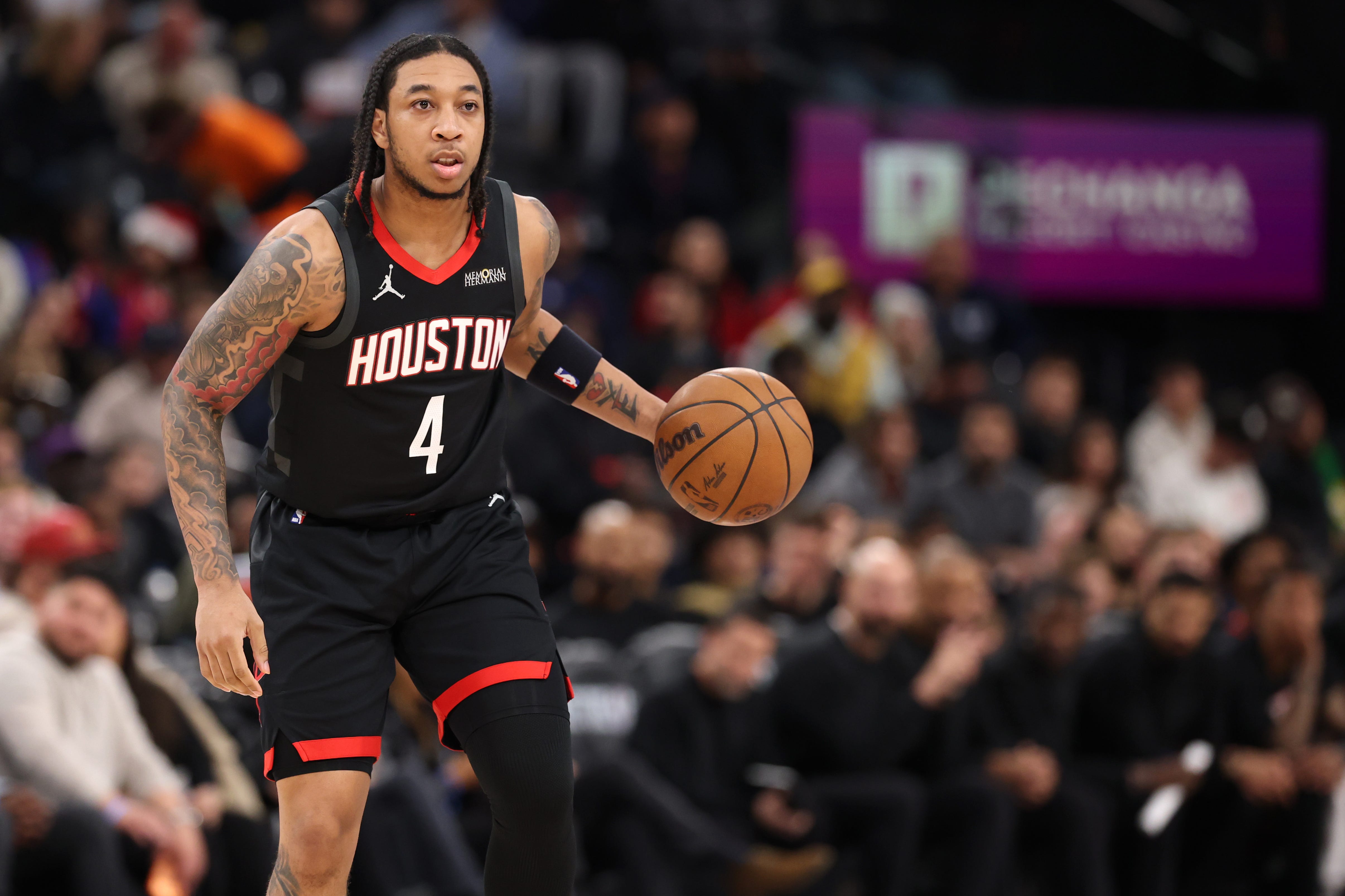 Dec 23, 2025; Inglewood, California, USA; Houston Rockets guard JD Davison (4) brings the ball up court during the fourth quarter against the Los Angeles Clippers at Intuit Dome. Mandatory Credit: Kiyoshi Mio-Imagn Images