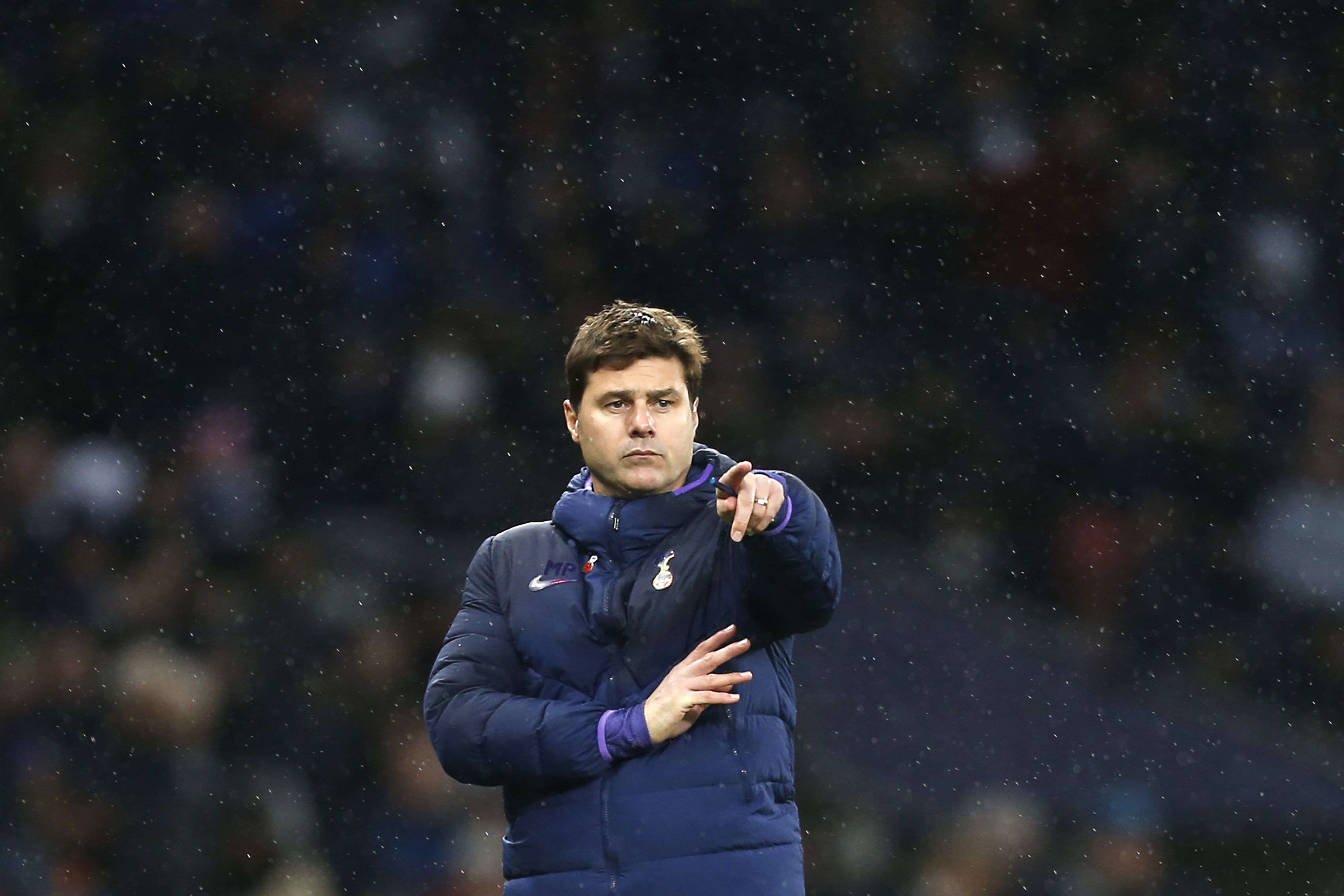 Tottenham Hotspur's Argentinian head coach Mauricio Pochettino gestures during the English Premier League football match between Tottenham Hotspur and Sheffield United at Tottenham Hotspur Stadium in London, on November 9, 2019. (Photo by Ian KINGTON / AFP) / RESTRICTED TO EDITORIAL USE. No use with unauthorized audio, video, data, fixture lists, club/league logos or 'live' services. Online in-match use limited to 120 images. An additional 40 images may be used in extra time. No video emulation. Social media in-match use limited to 120 images. An additional 40 images may be used in extra time. No use in betting publications, games or single club/league/player publications. / (Photo by IAN KINGTON/AFP via Getty Images)