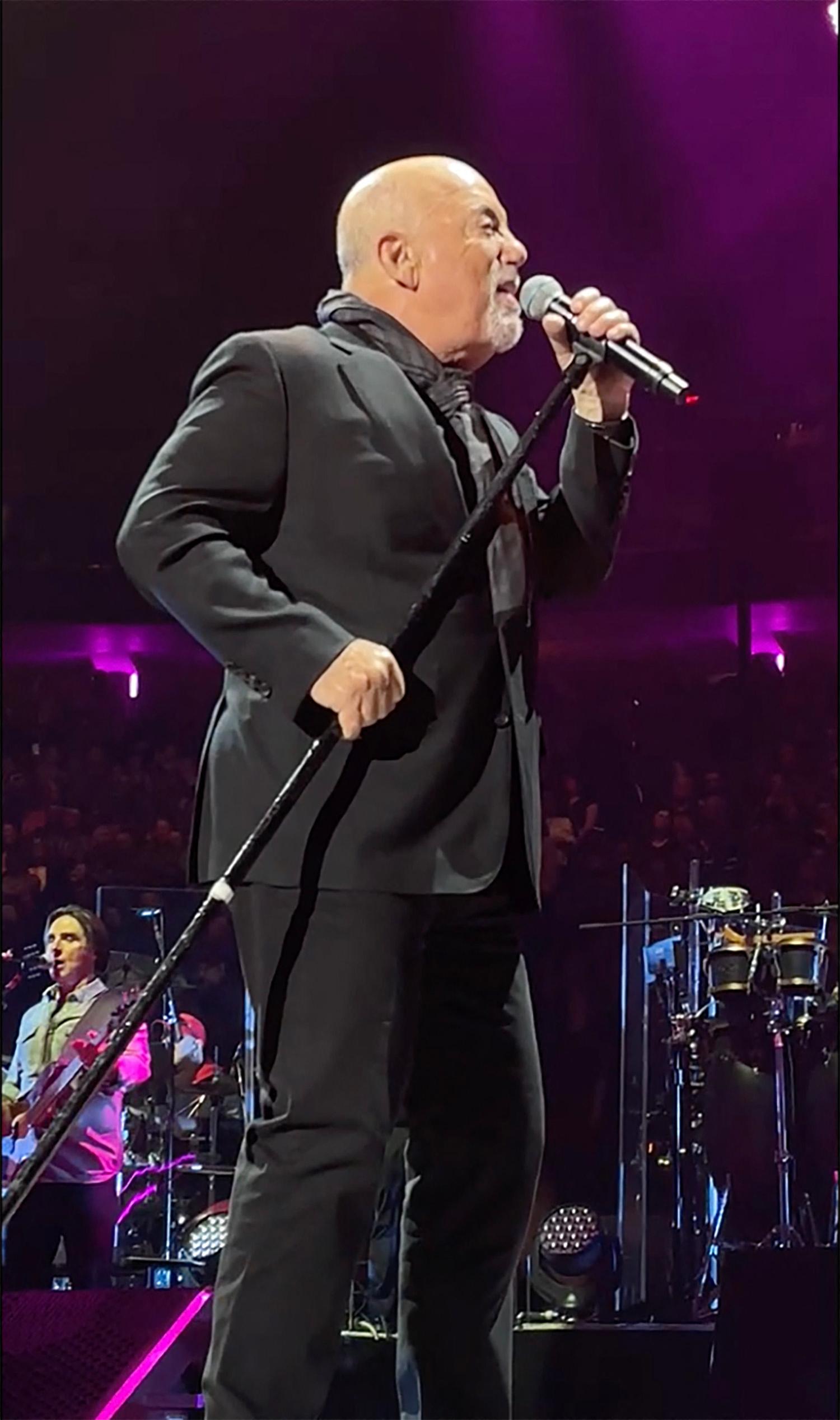 Billy Joel serenades ex-wife Christie Brinkley with a performance of their '80s smash hit 'Uptown Girl' during his NYC concert.