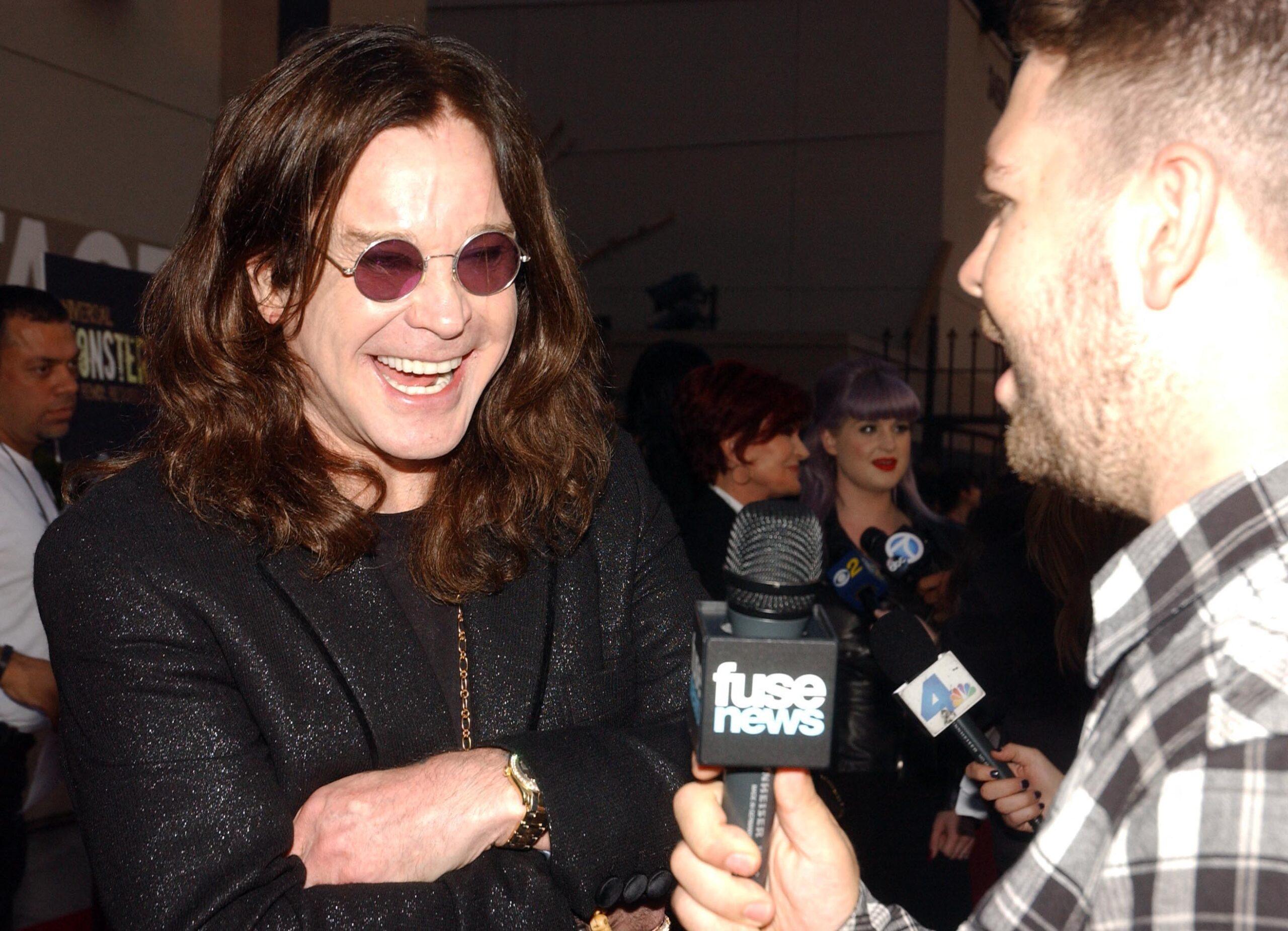Ozzy Osbourne being interviewed by his son Jack Osbourne