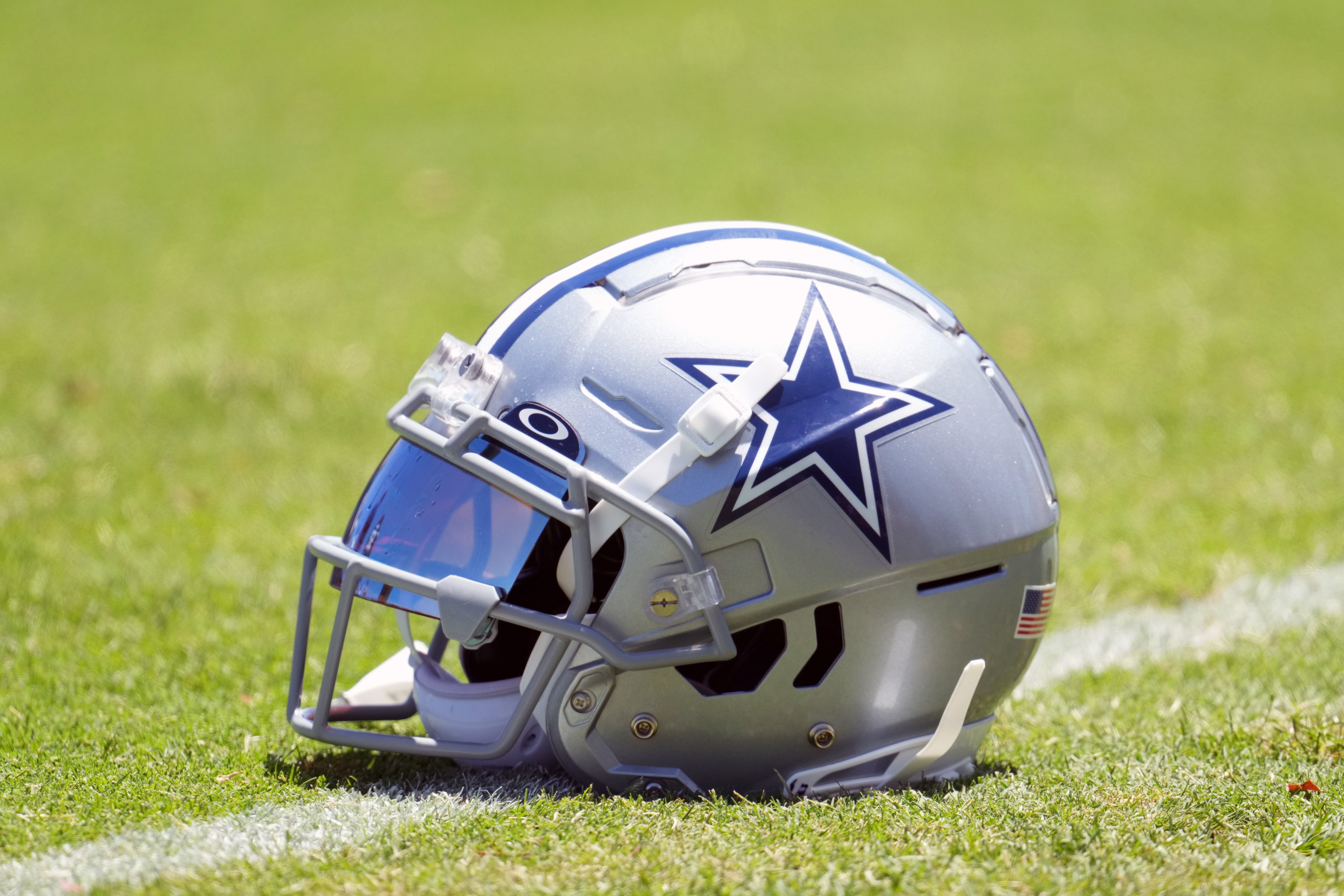 A Dallas Cowboys helmet with Oakley visor.