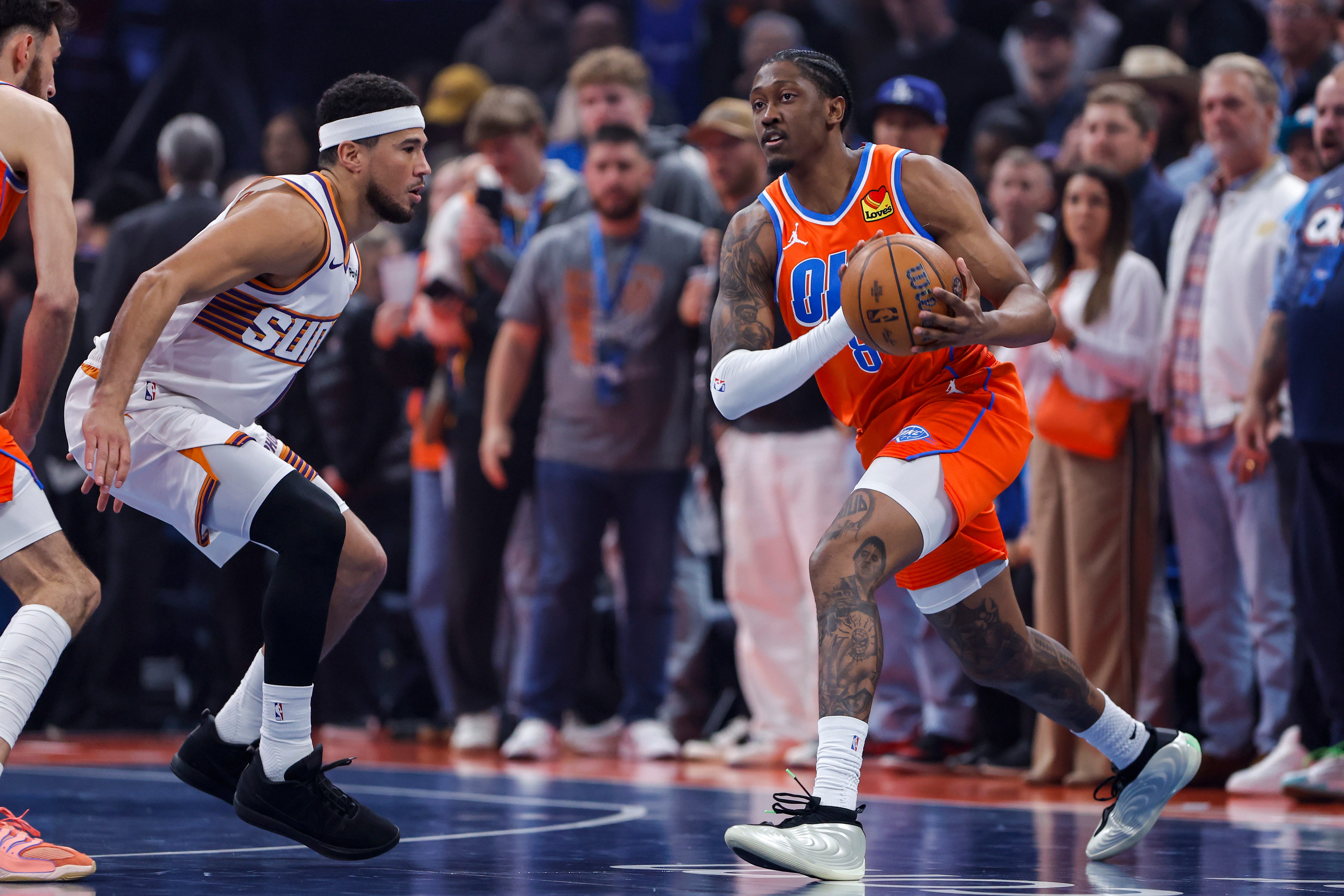 Nov 28, 2025; Oklahoma City, Oklahoma, USA; Oklahoma City Thunder guard Jalen Williams (8) moves the ball against the Phoenix Suns during the first quarter at Paycom Center. Mandatory Credit: Alonzo Adams-Imagn Images