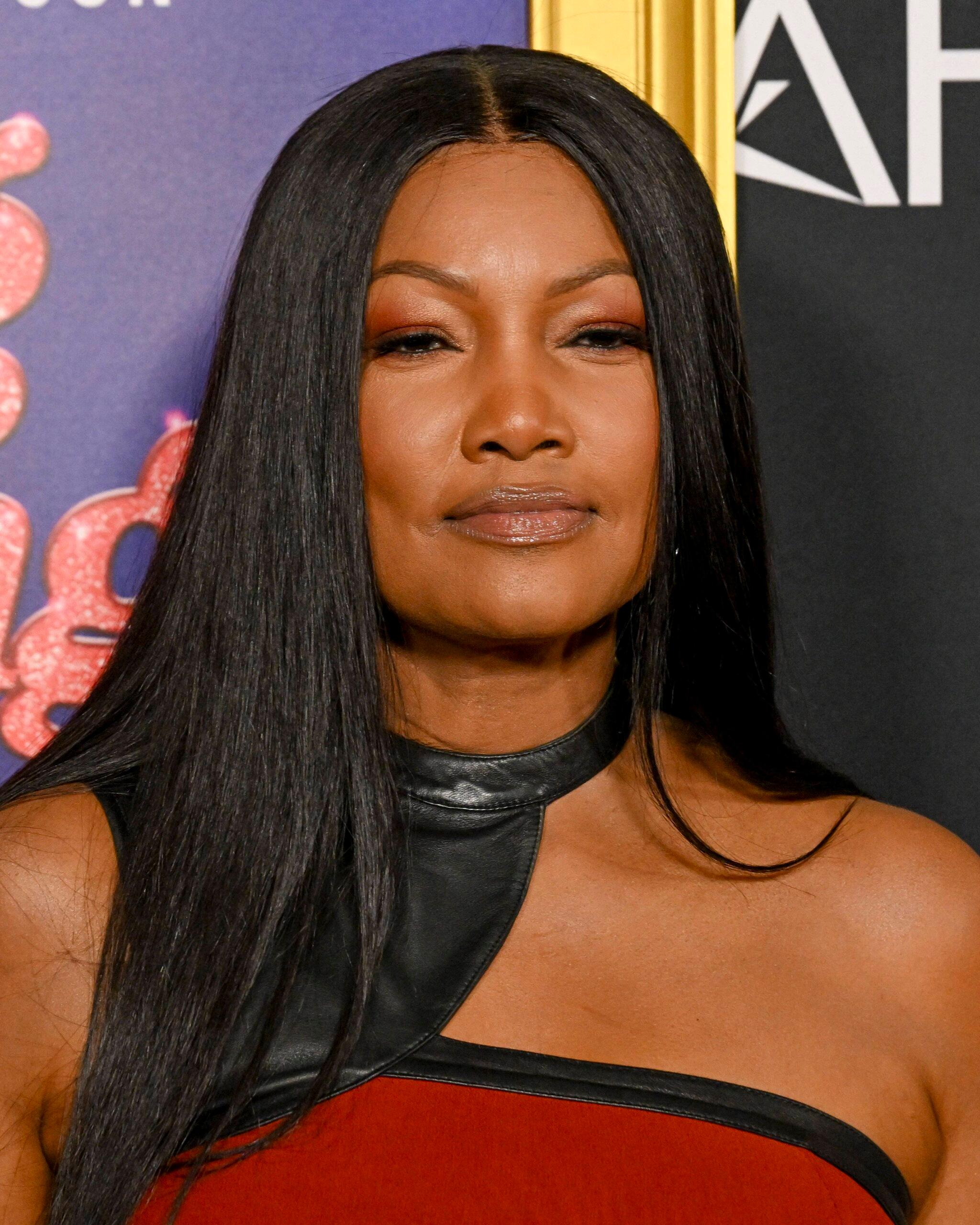 Garcelle Beauvais posing on the red carpet. 