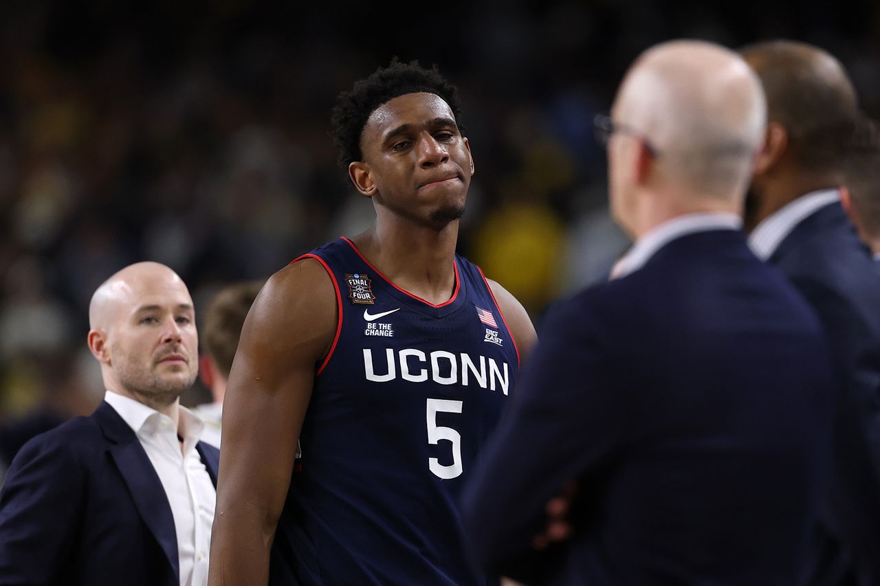 UConn players reel in national championship loss on Monday nightCredit: Patrick Smith/Getty