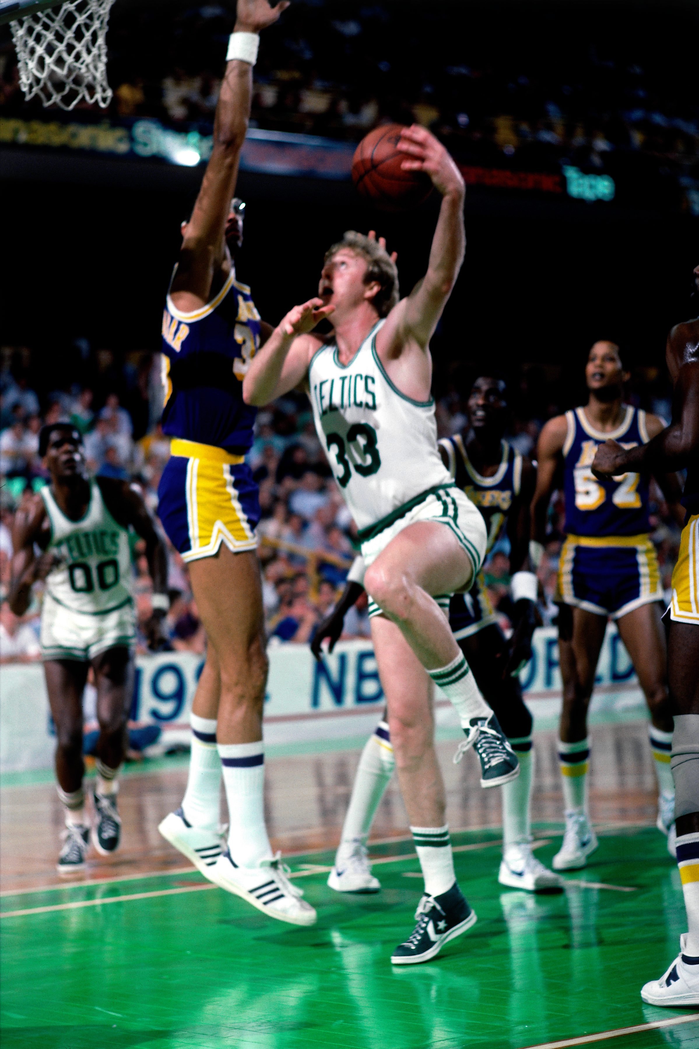 BOSTON - JUNE 12: Larry Bird #33 of the Boston Celtics goes up for a shot against Kareem Abdul Jabbar #33 of the Los Angeles Lakers during Game Seven of the 1984 NBA Finals played on June 12 at the Boston Garden in Boston, Massachusetts. The Boston Celtics defeated the Los Angeles Lakers 111-102 and won the series 4-3 to capture the 1984 NBA Championship. NOTE TO USER: User expressly acknowledges that, by downloading and or using this photograph, User is consenting to the terms and conditions of the Getty Images License agreement. Mandatory Copyright Notice: Copyright 1984 NBAE (Photo by Dick Raphael/NBAE via Getty Images)