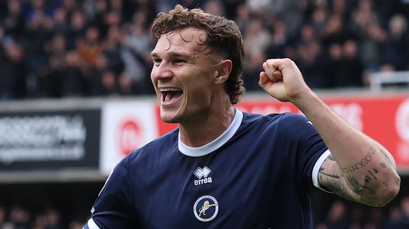 Jake Cooper celebrates scoring for Millwall