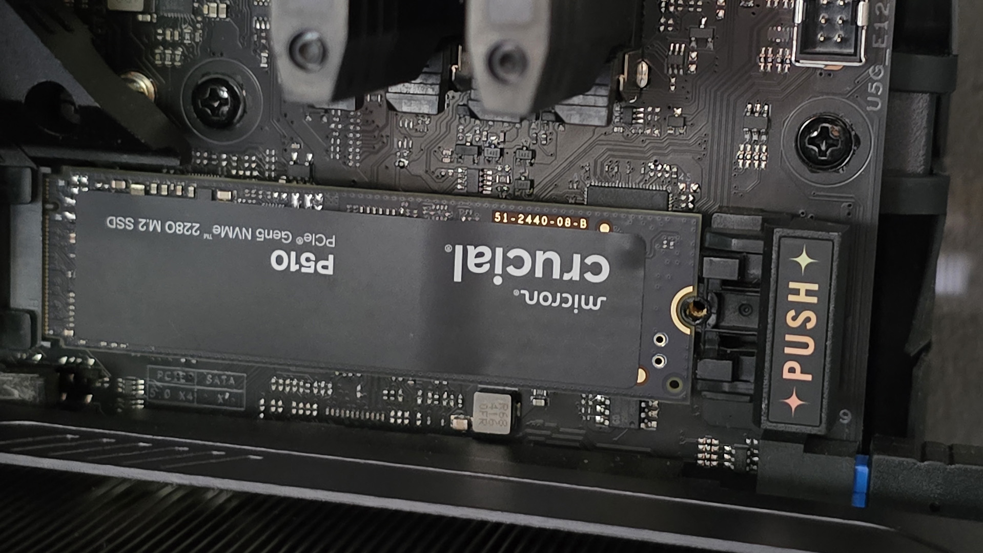 A Crucial P510 SSD installed in a gaming PC.