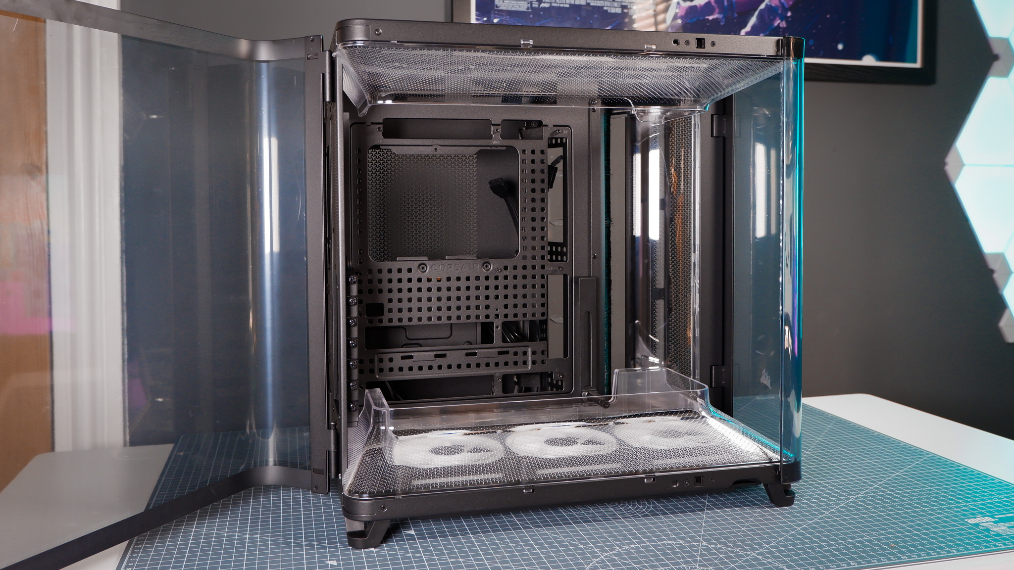 A Corsair Air 5400 PC case on a desk with various parts installed.