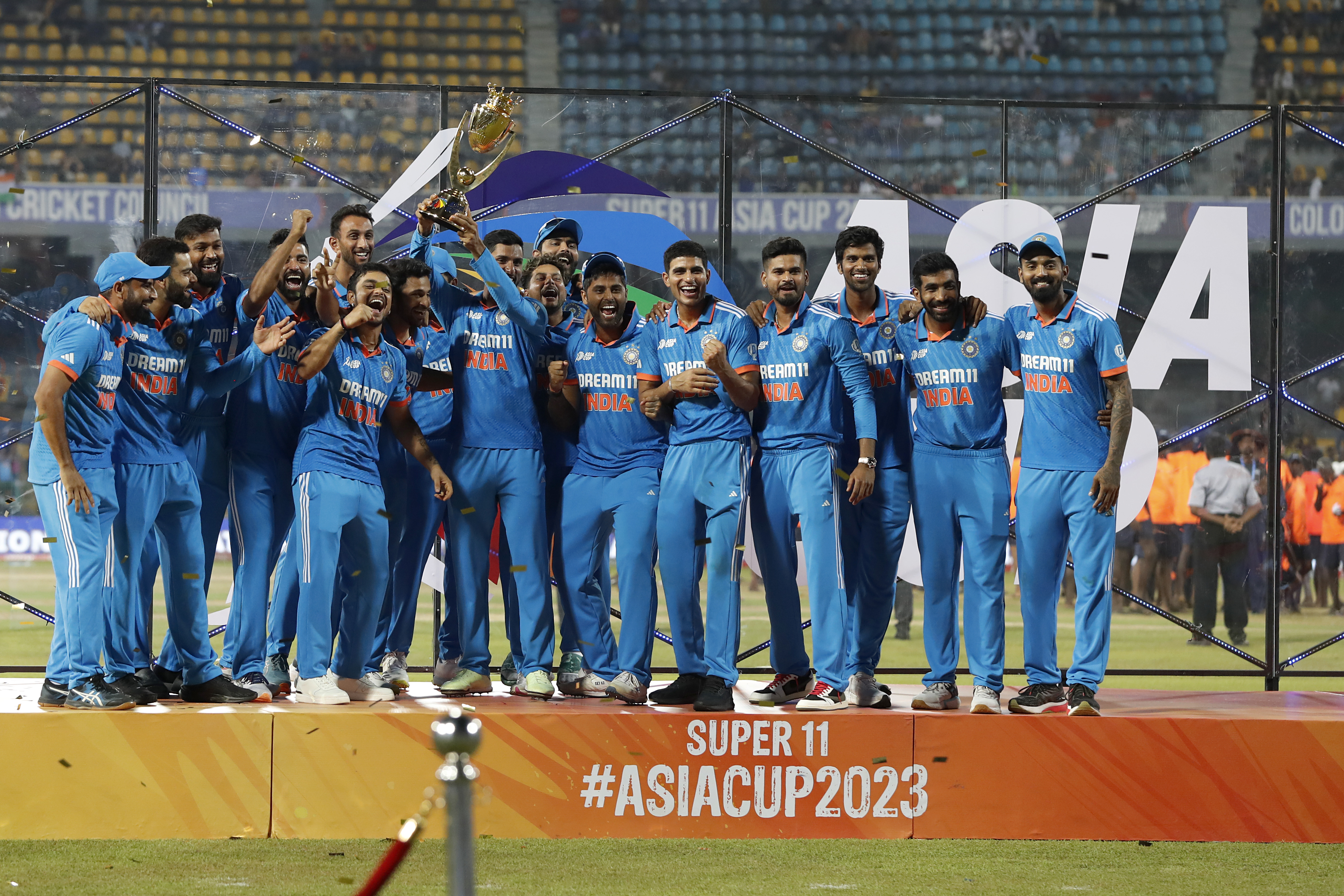 COLOMBO, SRI LANKA - SEPTEMBER 17: India's players celebrate with the trophy after winning the during the Asia Cup Final match between India and Sri Lanka at R. Premadasa Stadium on September 17, 2023 in Colombo, Sri Lanka. (Photo by Surjeet Yadav/Getty Images)