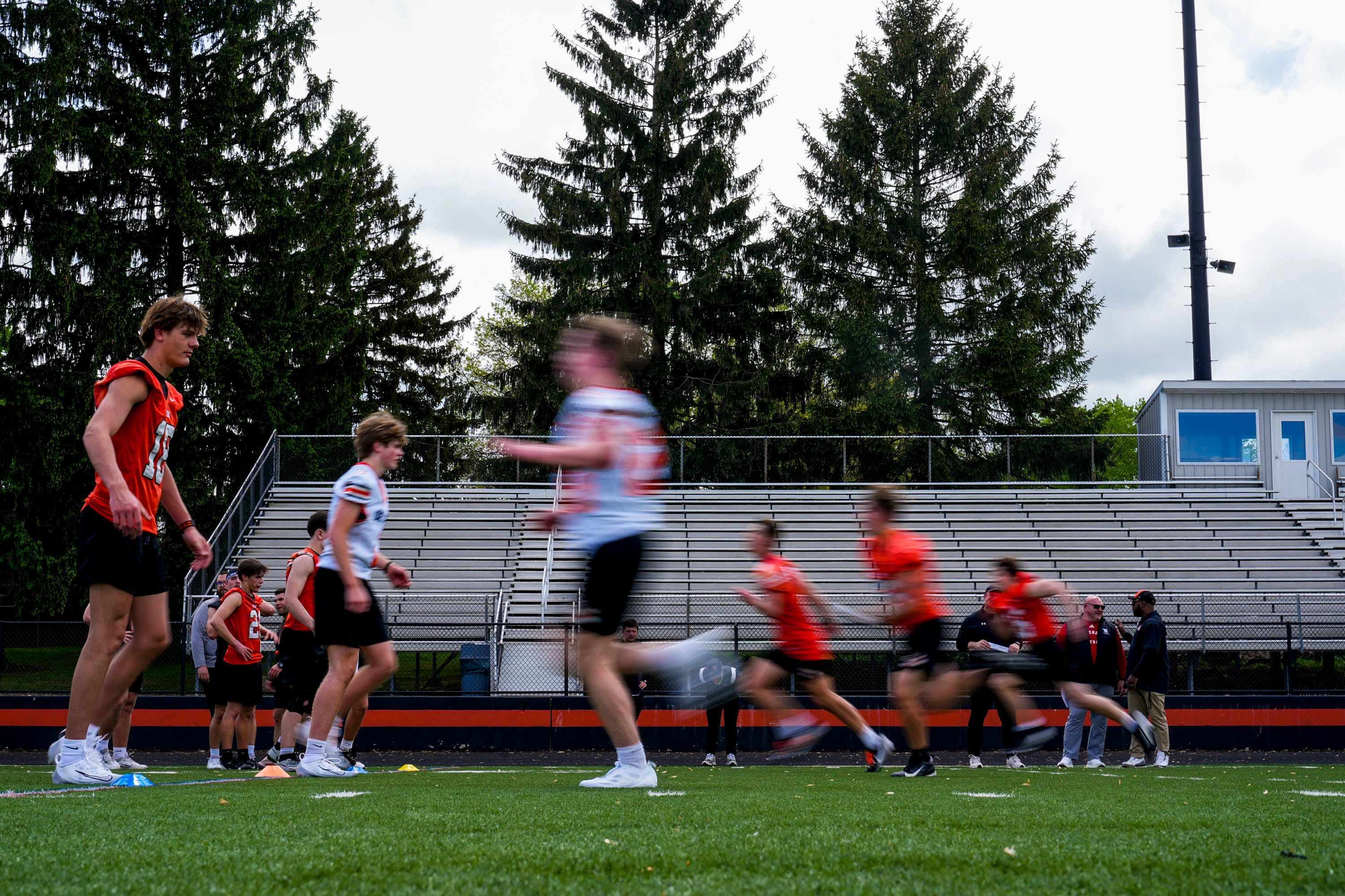 Delaware Hayes football players participate in a drill during their college showcase day in May 2025. The Pacers are among dozens of central Ohio teams that will take part in another showcase day for college coaches in early May.