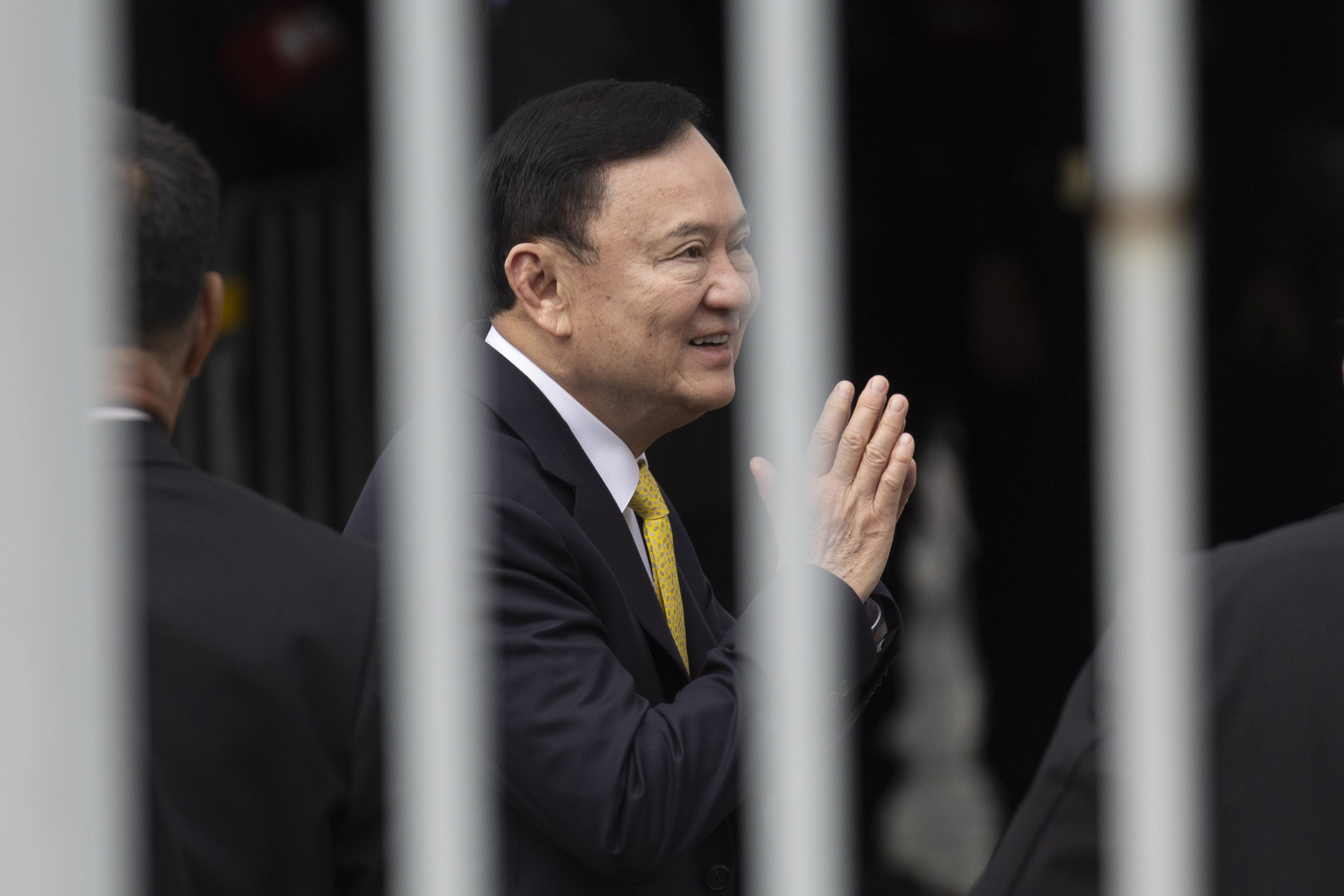 Thailand's former Prime Minister Thaksin Shinawatra arrives at the Supreme Court in Bangkok, Thailand, Tuesday, Sept. 9, 2025. (AP Photo/Wason Wanitchakorn)