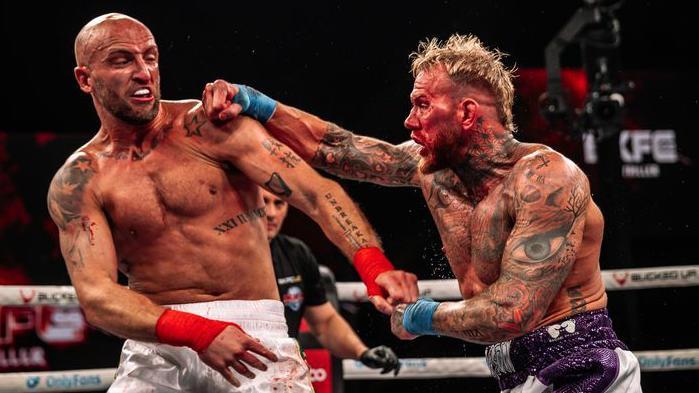 Conor Cooke (left) in action against Matthew Hodgson 