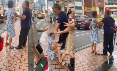 北車公車站驚見家暴！男雨傘狂毆、當街拖妻　熱心民眾全圍上來