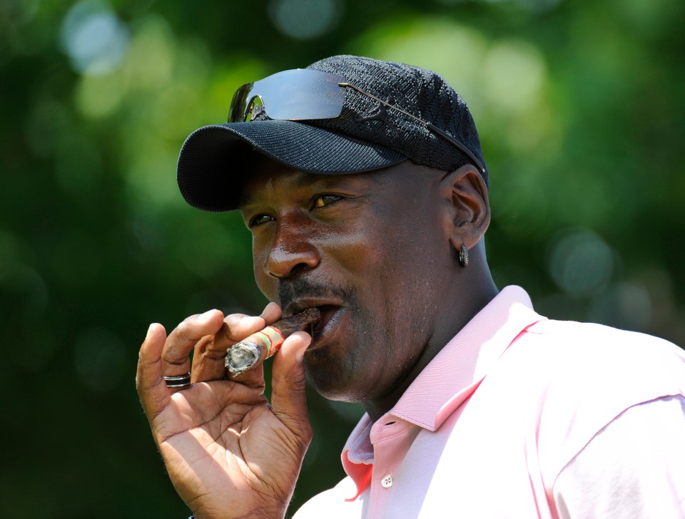 OAKVILLE, ONTARIO, CANADA - JULY 20: Five-time NBA MVP Michael Jordan smokes a cigar after hitting to the seventh green during the RBC Canadian Open's Mike Weir Charity Classic Pro-Am at Glen Abbey Golf Club on July 20, 2009 in Oakville, Ontario, Canada. (Photo by Stan Badz/PGA TOUR)