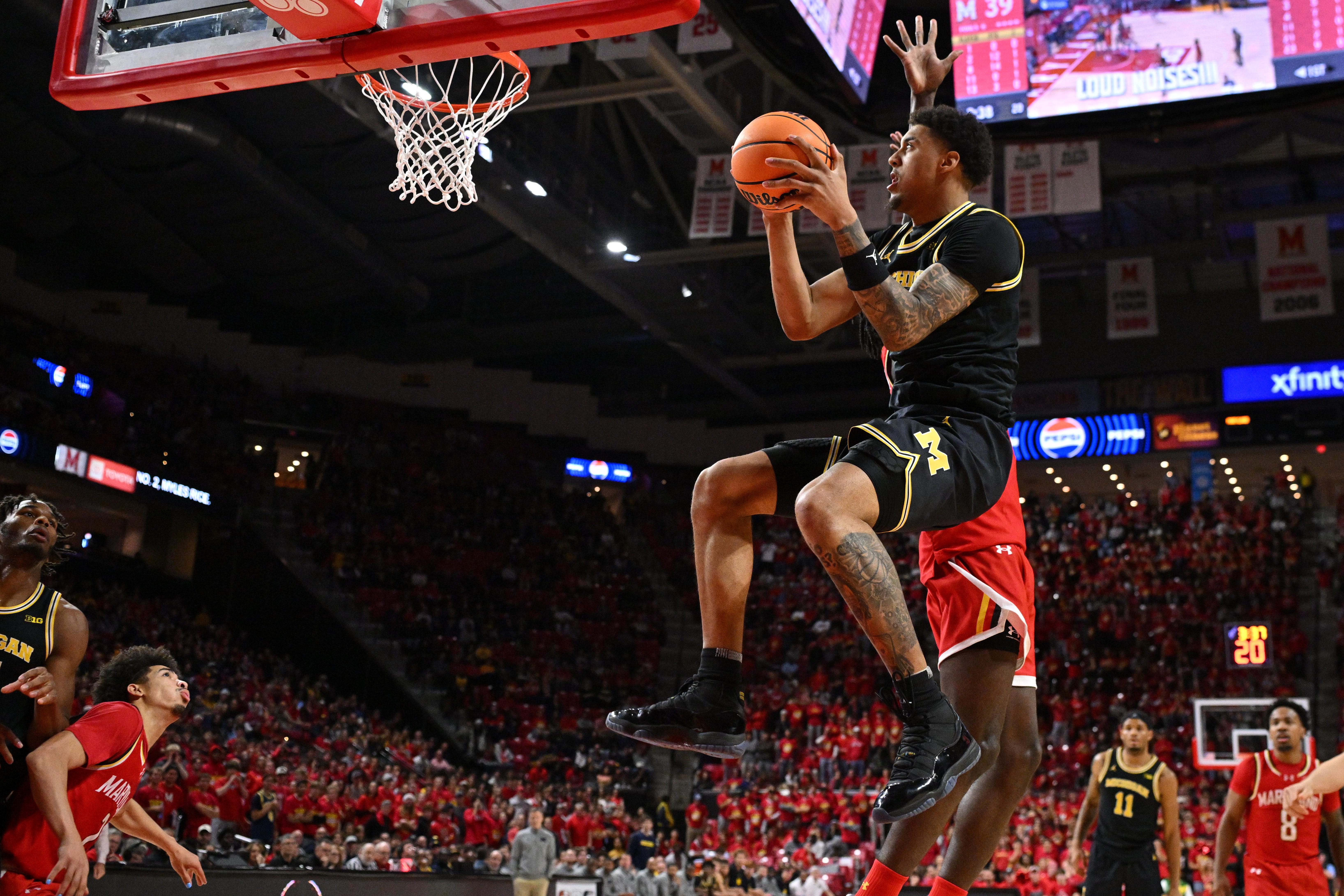 Michigan Wolverines forward Yaxel Lendeborg drives to the basket for a layup in the first half against the Maryland Terrapins at Xfinity Center, Dec. 13, 2025 in College Park, Maryland.