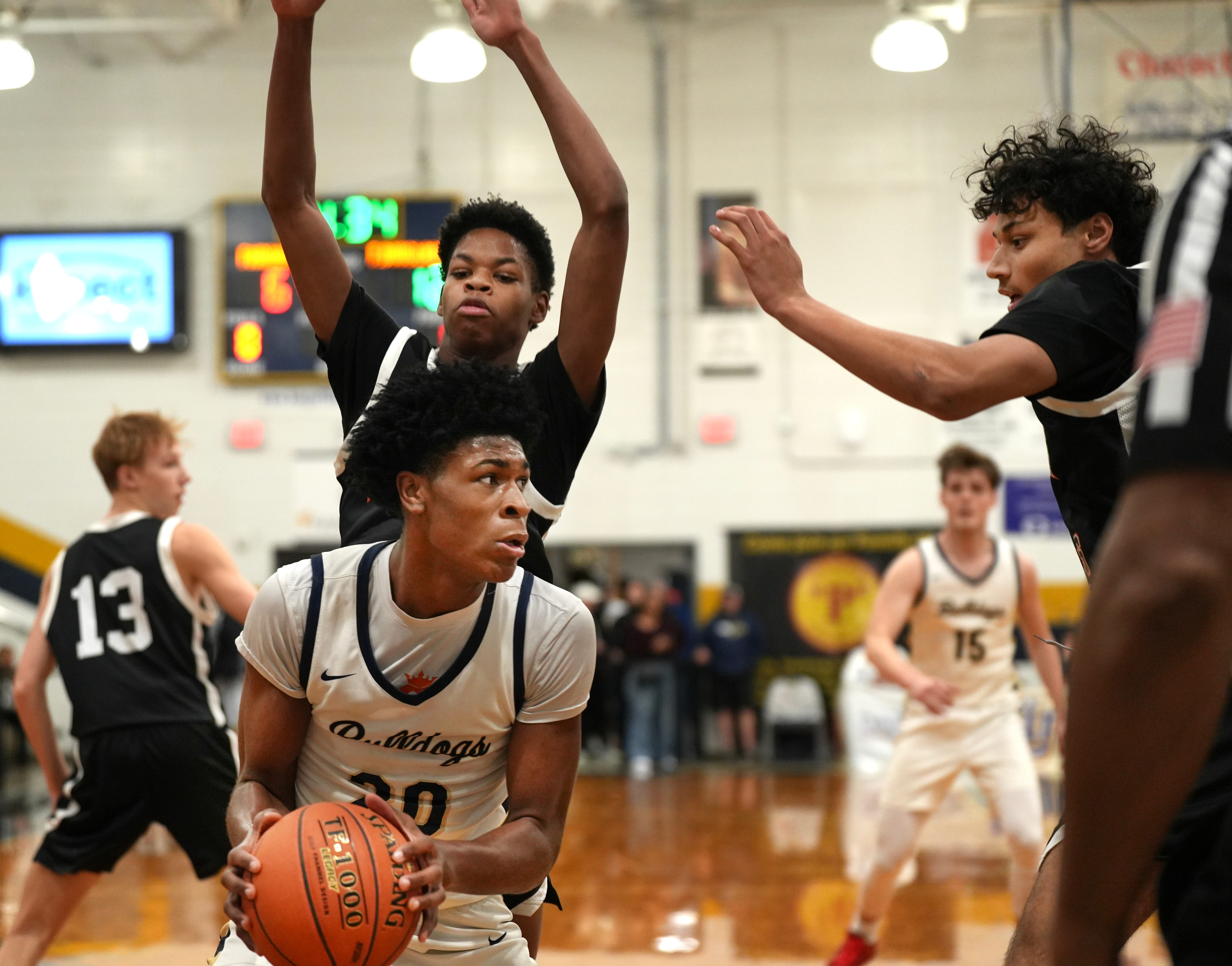 Fairdale’s Ferlandes Wright takes the ball underneath against Frederick Douglass on Friday, Dec. 20, 2024, at King of the Bluegrass.