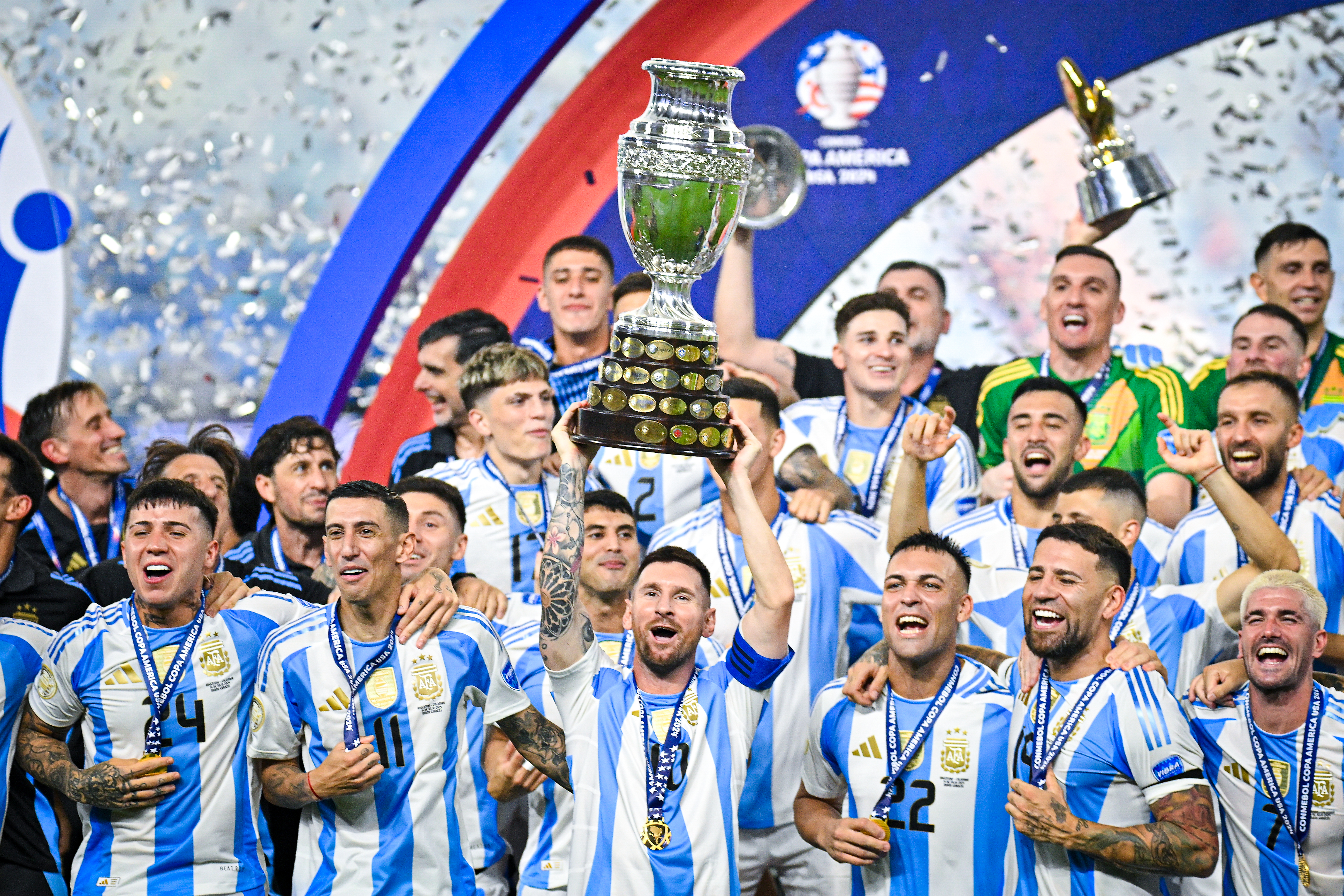 MIAMI GARDENS, FLORIDA - JULY 14: Lionel Messi (10) lifts up the trophy as players of Argentina celebrate the winning of the final match of Copa America against Colombia at Hard Rock Stadium in Miami, Florida, United States on July 14, 2024. (Photo by Miguel Rodriguez/Anadolu via Getty Images)
